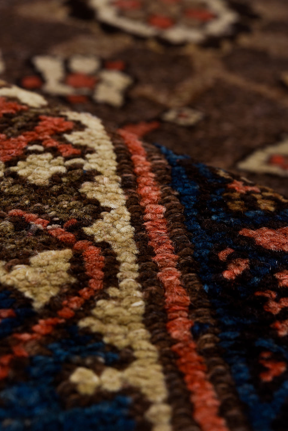 5' x 11' one-of-a-kind handmade vintage Malayer rug. Color palette: brown, ivory, rust, indigo, blue, coral, taupe