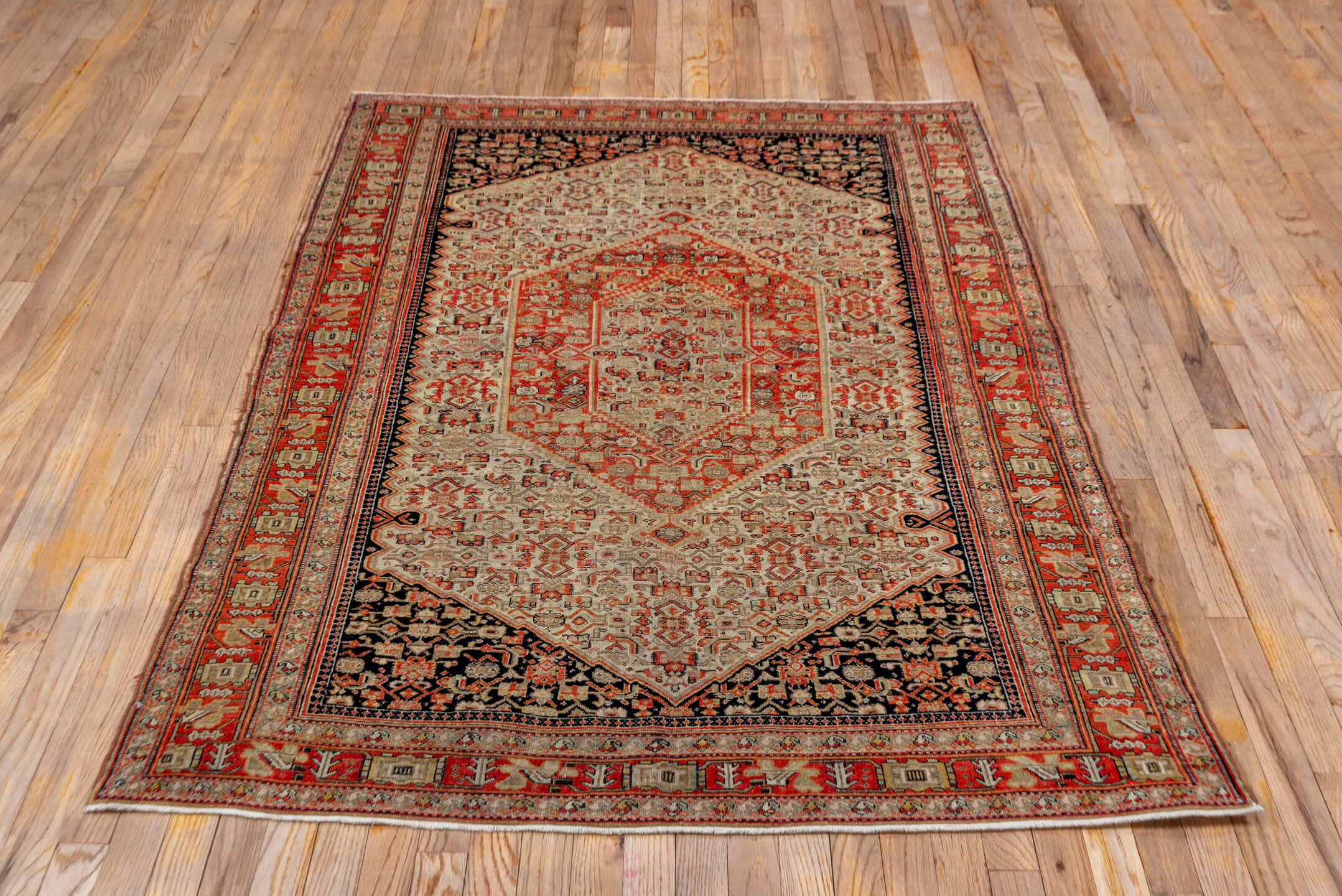 4' x 6' one-of-a-kind handmade vintage Senne small size rug. Color palette: black, brown, gray, pink, red
