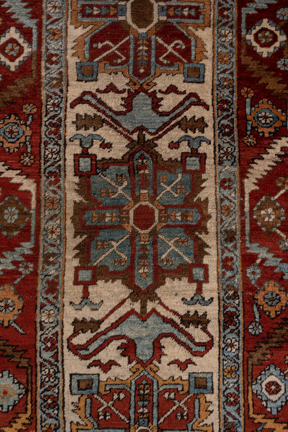 3' x 17' one-of-a-kind handmade vintage Serapi runner rug. Color palette: rust, ivory, sky blue, navy, camel, brown