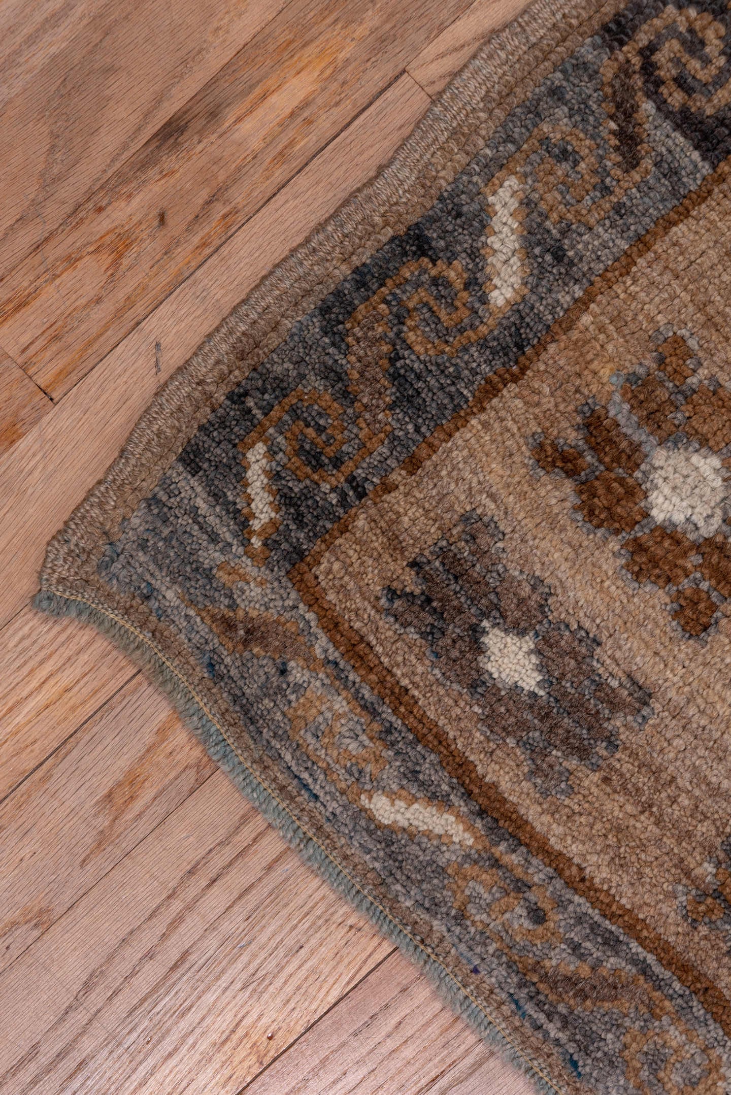 7' x 11' one-of-a-kind handmade antique Kars large size rug. Color palette: taupe, brown, camel, ivory, charcoal, beige