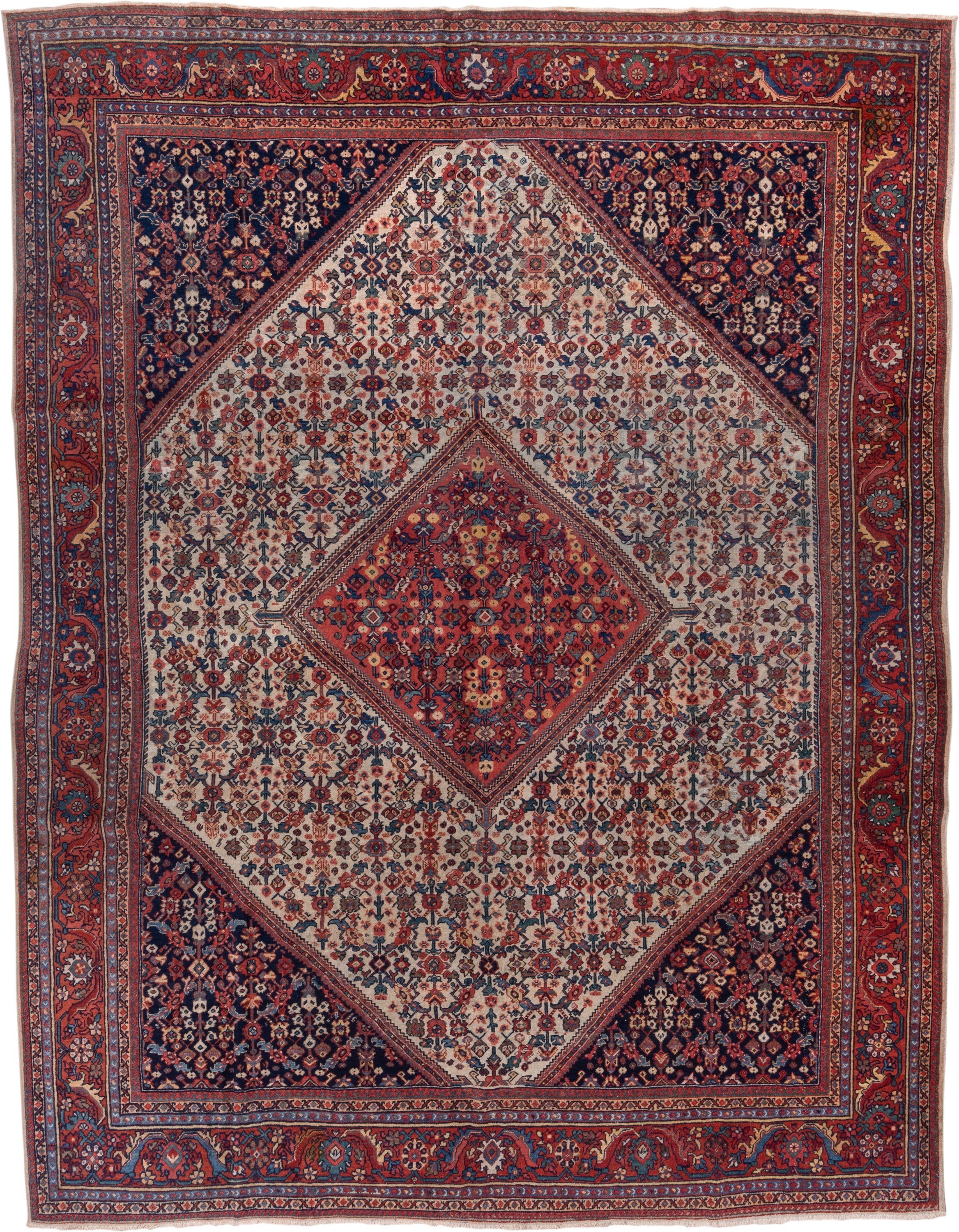 9' x 11' one-of-a-kind handmade antique Farahan large size rug. Color palette: ivory, rust, navy, crimson, indigo, camel