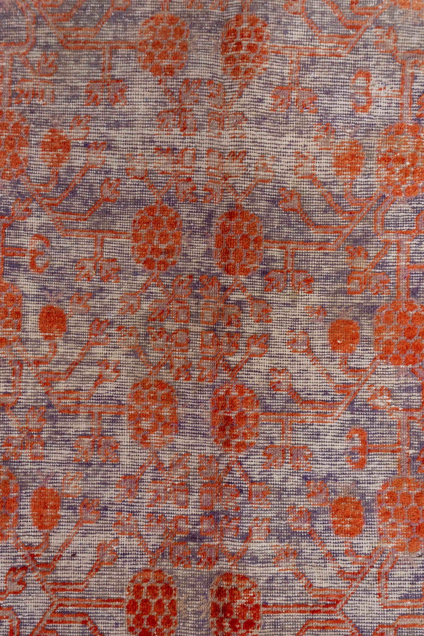 6' x 11' one-of-a-kind handmade antique Khotan large size rug. Color palette: lavender, rust, plum, gold, taupe, rose