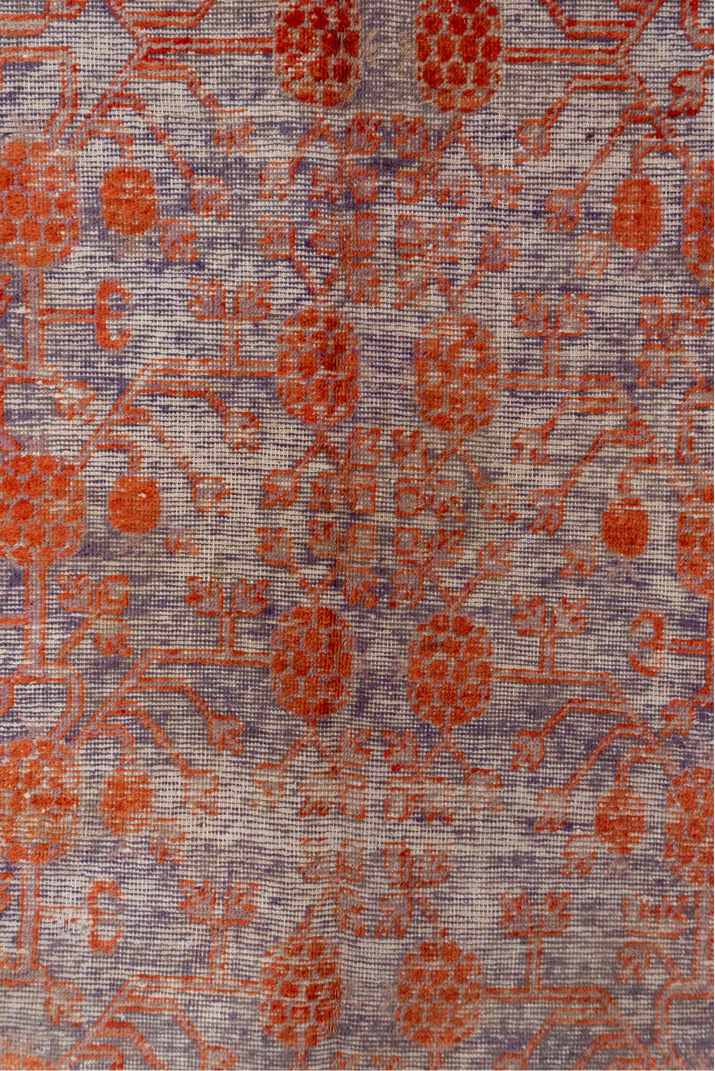 6' x 11' one-of-a-kind handmade antique Khotan large size rug. Color palette: lavender, rust, plum, gold, taupe, rose