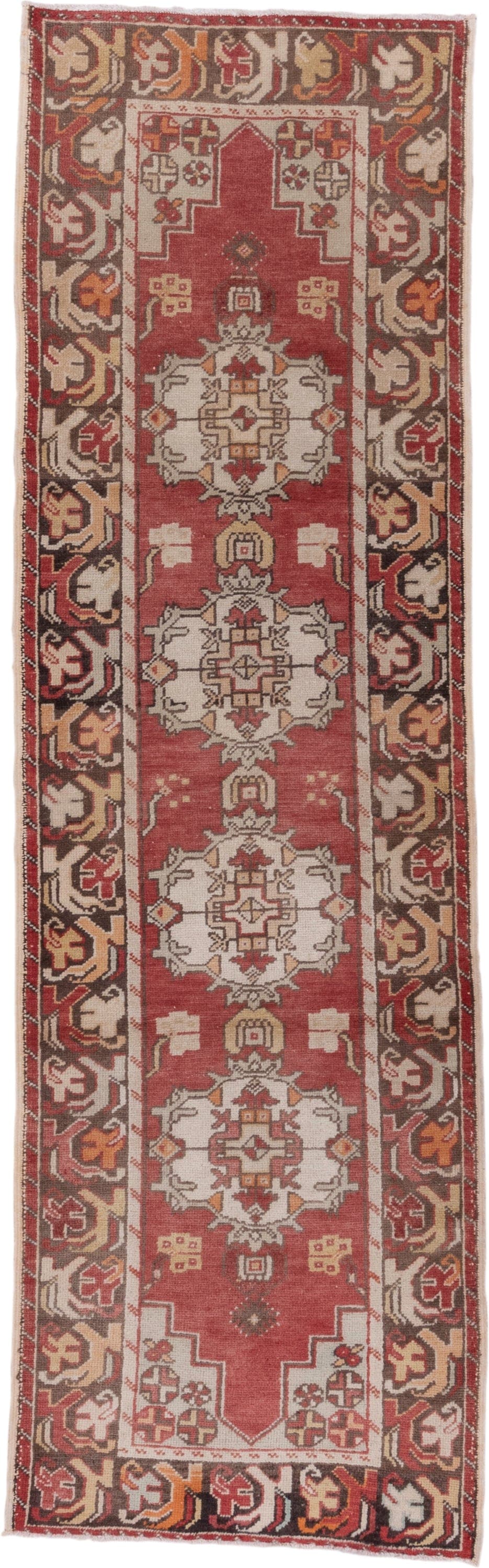2' x 9' one-of-a-kind handmade vintage Oushak runner rug. Color palette: rust, ivory, charcoal, terra cotta, camel, rose