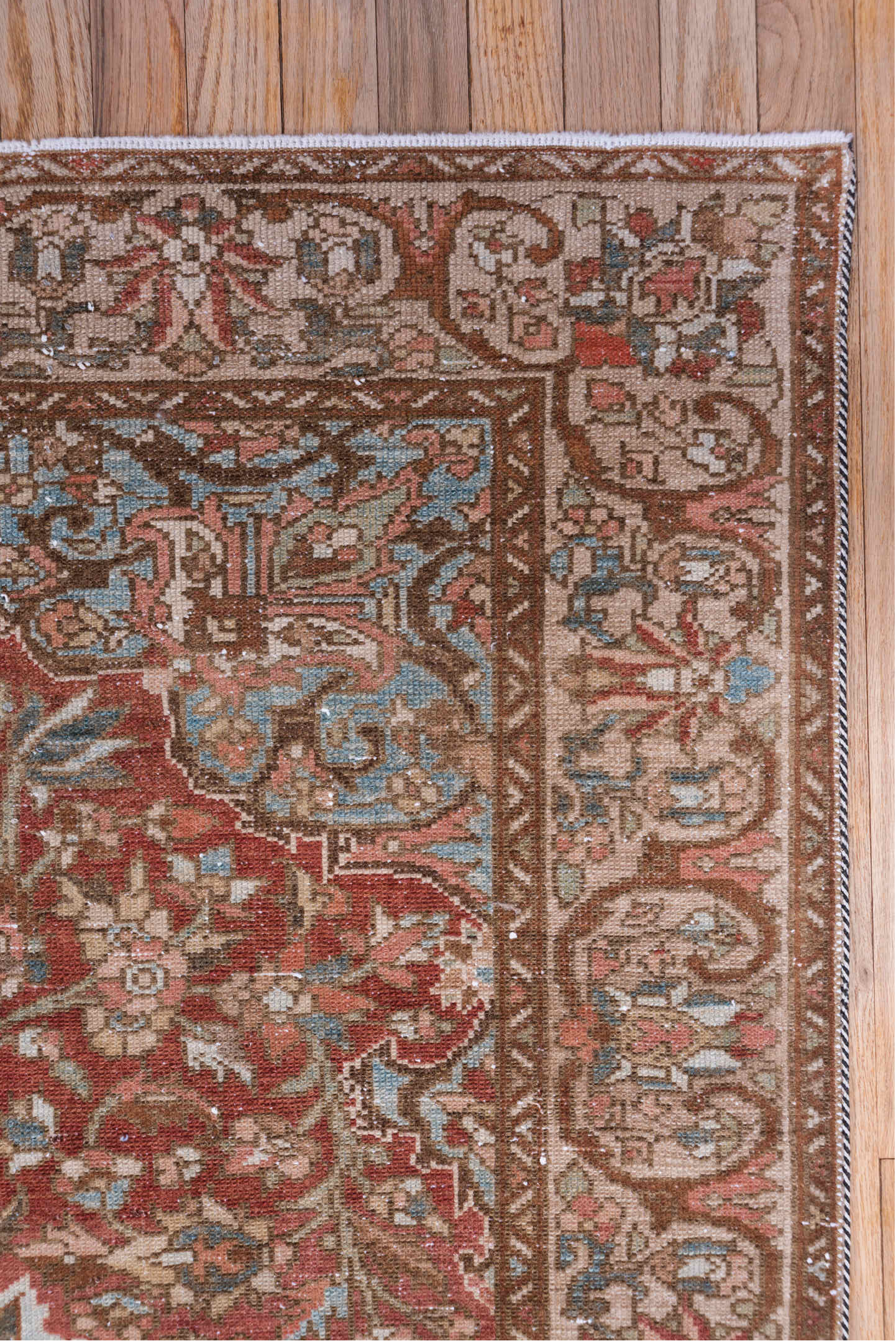 4' x 6' one-of-a-kind handmade vintage Baktiary small size rug. Color palette: rust, taupe, ivory, sky blue, brown, rose