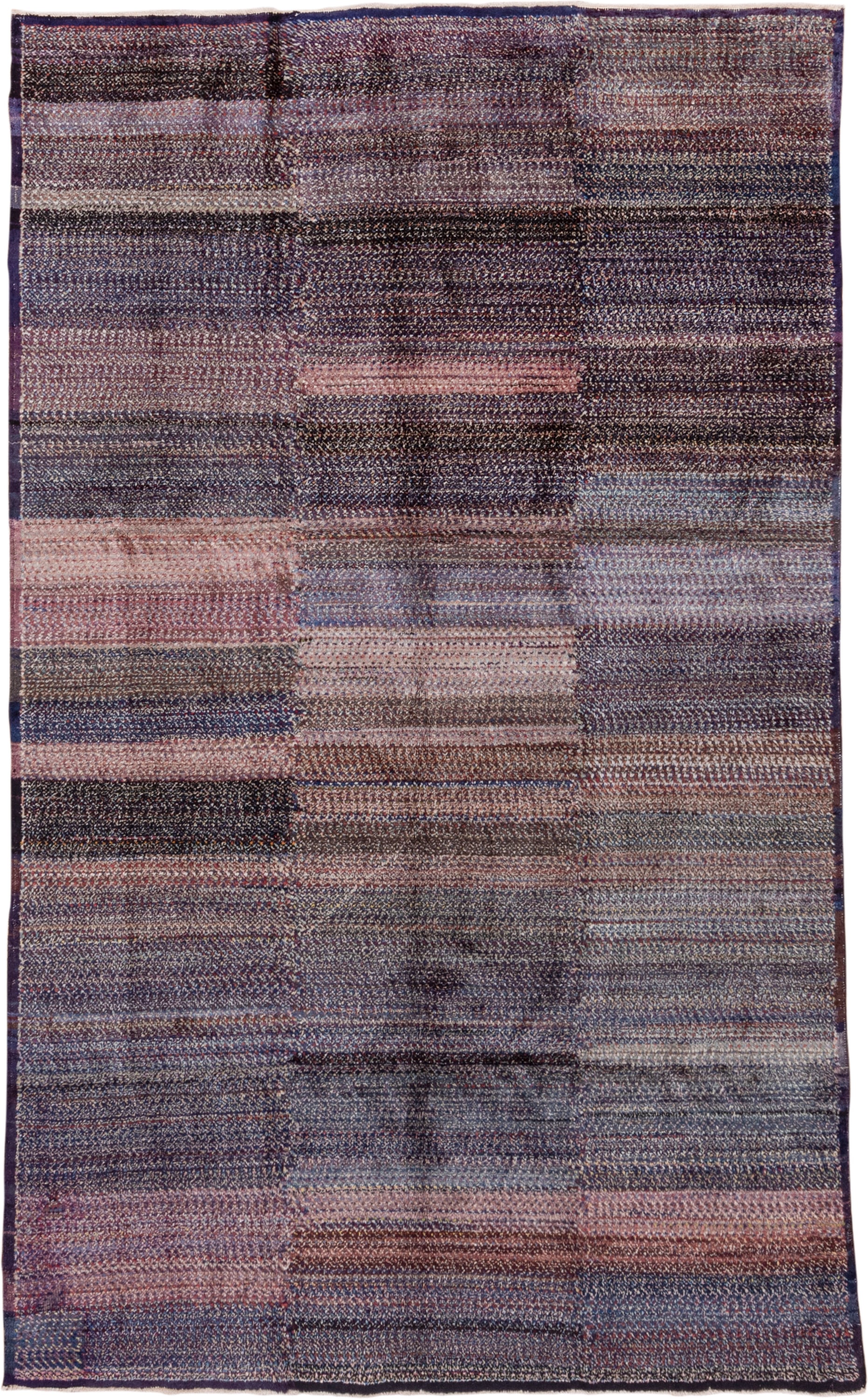 5' x 9' one-of-a-kind handmade vintage Sparta medium size rug. Color palette: indigo, plum, charcoal, rose, lavender, taupe