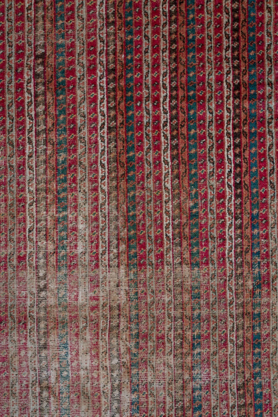 6' x 12' one-of-a-kind handmade antique Ghordes large size rug. Color palette: rust, brick, ivory, navy, rose, taupe
