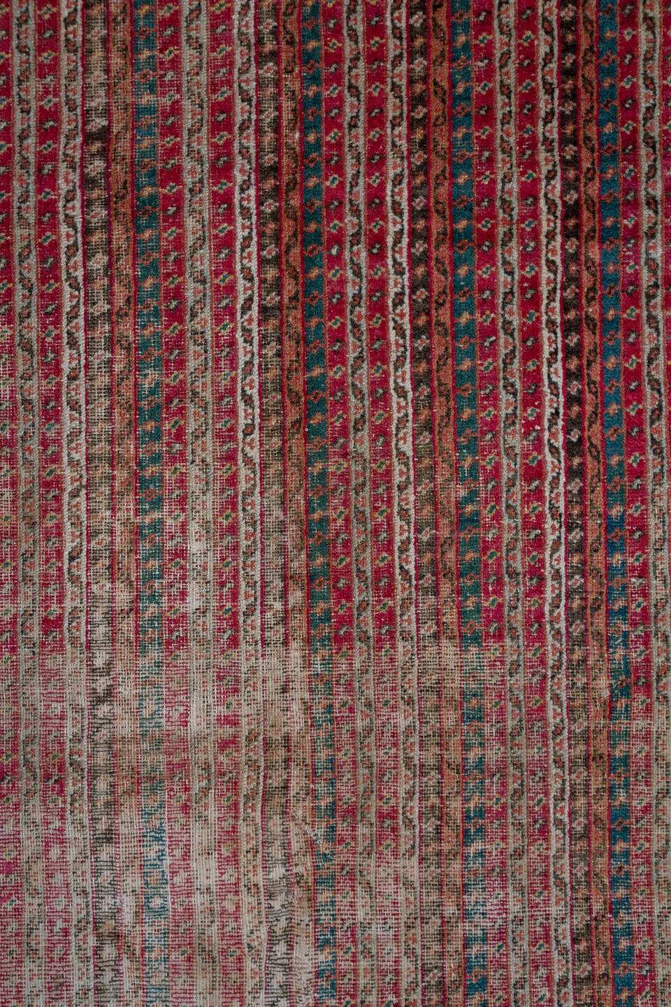 6' x 12' one-of-a-kind handmade vintage Ghordes large size rug. Color palette: black, blue, brown, charcoal, gray, pink, red