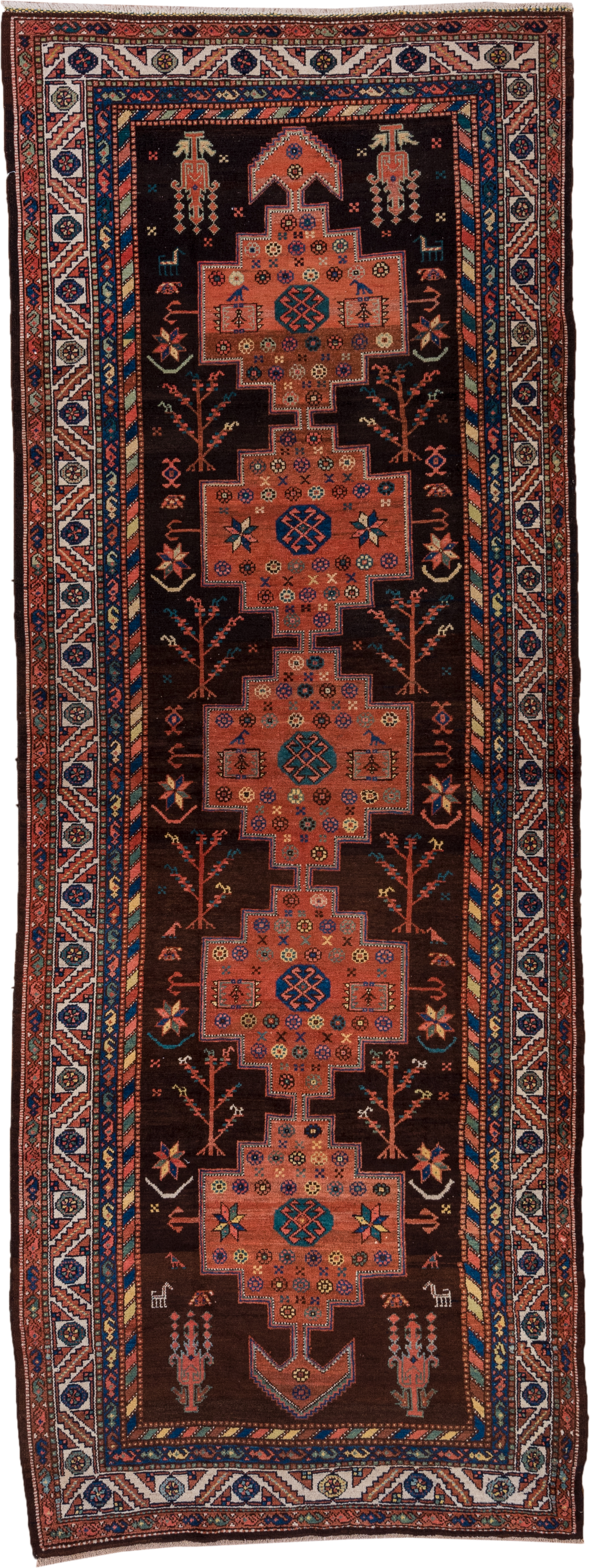 4' x 11' one-of-a-kind handmade antique Malayer runner rug. Color palette: brown, rust, ivory, navy, terra cotta, indigo