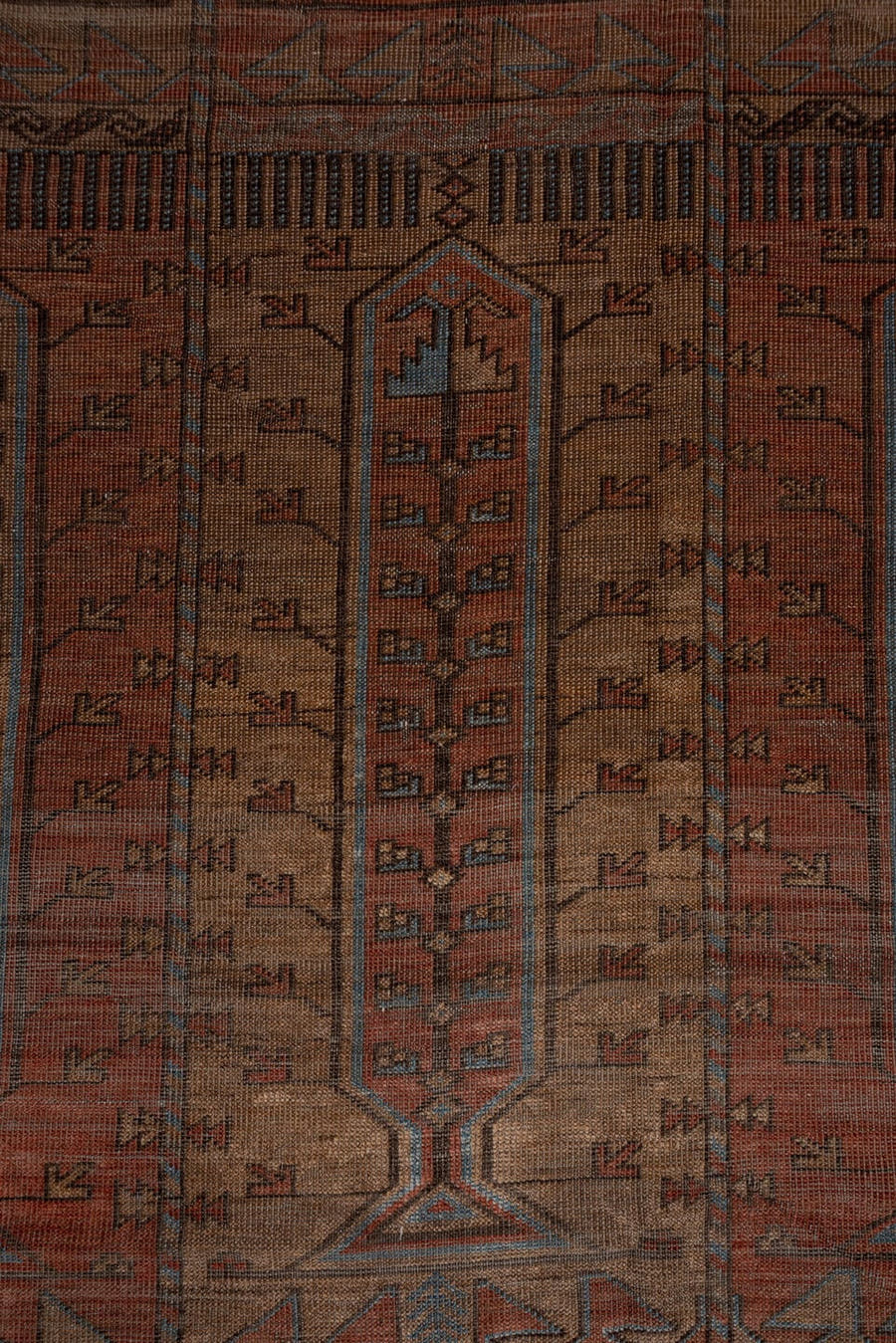 5' x 9' one-of-a-kind handmade antique Belouch large size rug. Color palette: rust, brown, slate, taupe, charcoal