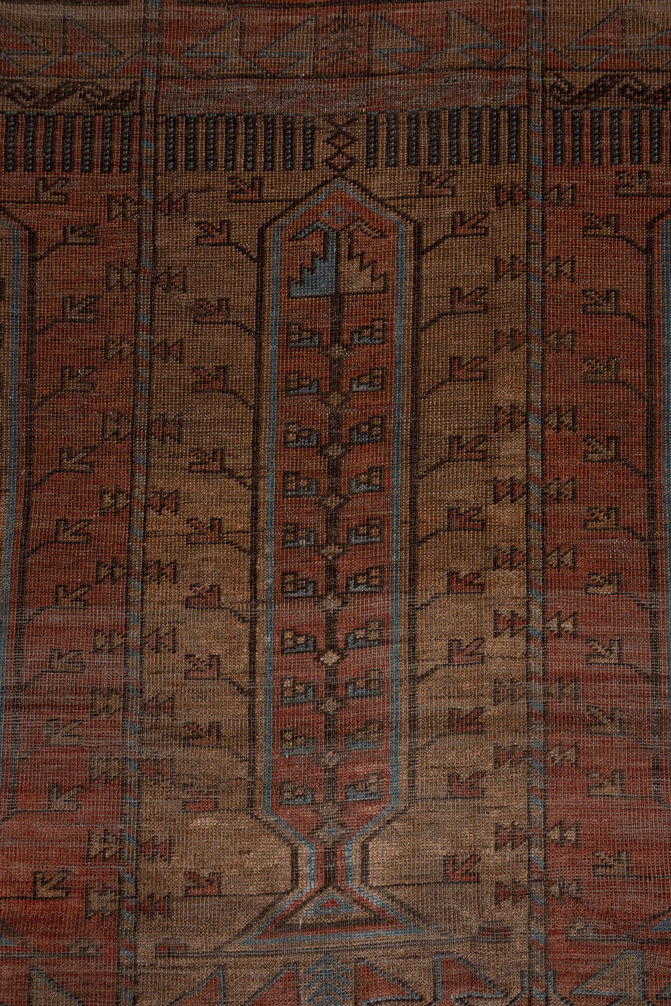 5' x 9' one-of-a-kind handmade antique Belouch large size rug. Color palette: rust, brown, slate, taupe, charcoal