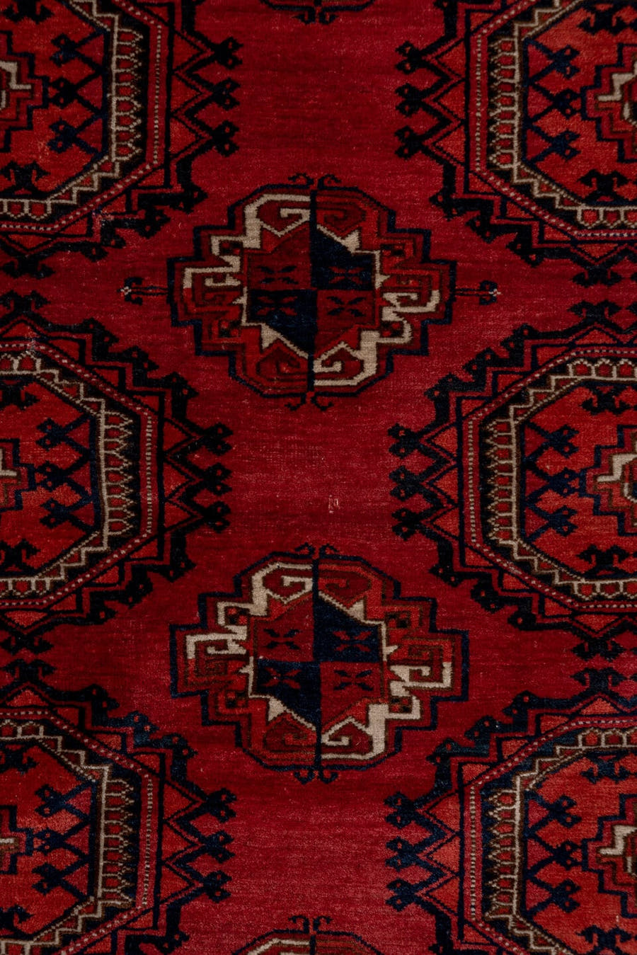 4' x 5' one-of-a-kind handmade antique Torkaman rug. Color palette: crimson, burgundy, rust, ivory, navy, charcoal, rose