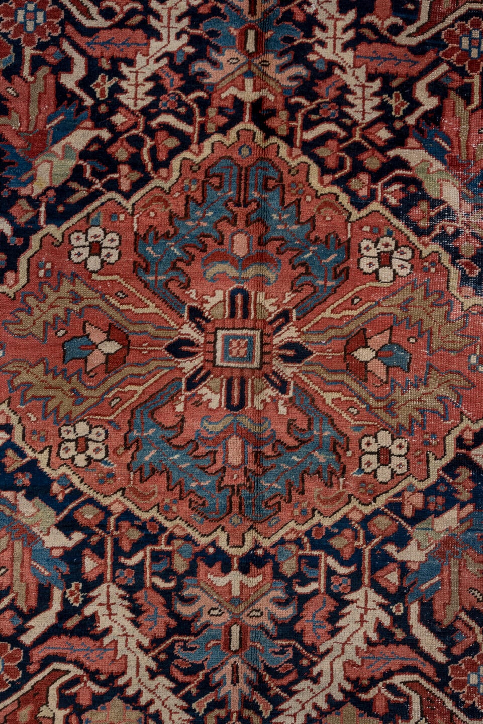 8' x 12' one-of-a-kind handmade antique Heriz large size rug. Color palette: rust, blue, ivory, navy, terra cotta, slate