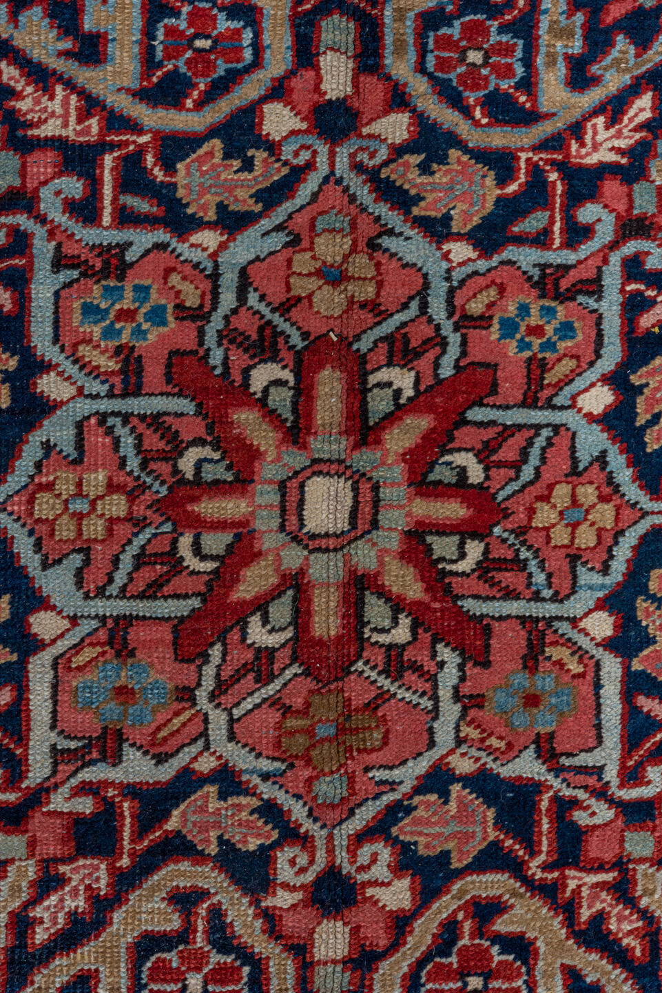7' x 10' one-of-a-kind handmade antique Heriz large size rug. Color palette: red, navy, ivory, sky blue, rose, burgundy