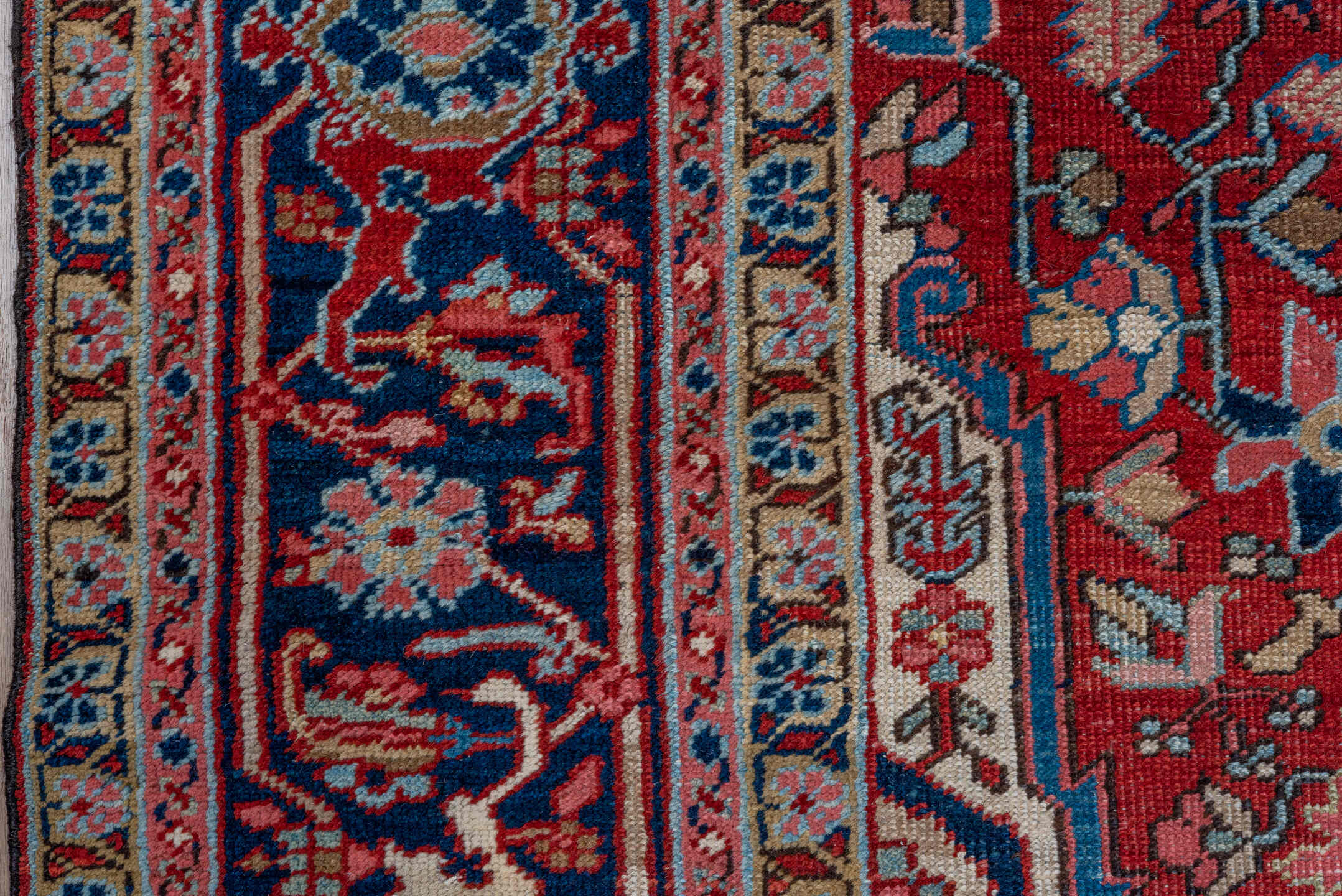 7' x 10' one-of-a-kind handmade antique Heriz large size rug. Color palette: red, navy, ivory, sky blue, rose, burgundy