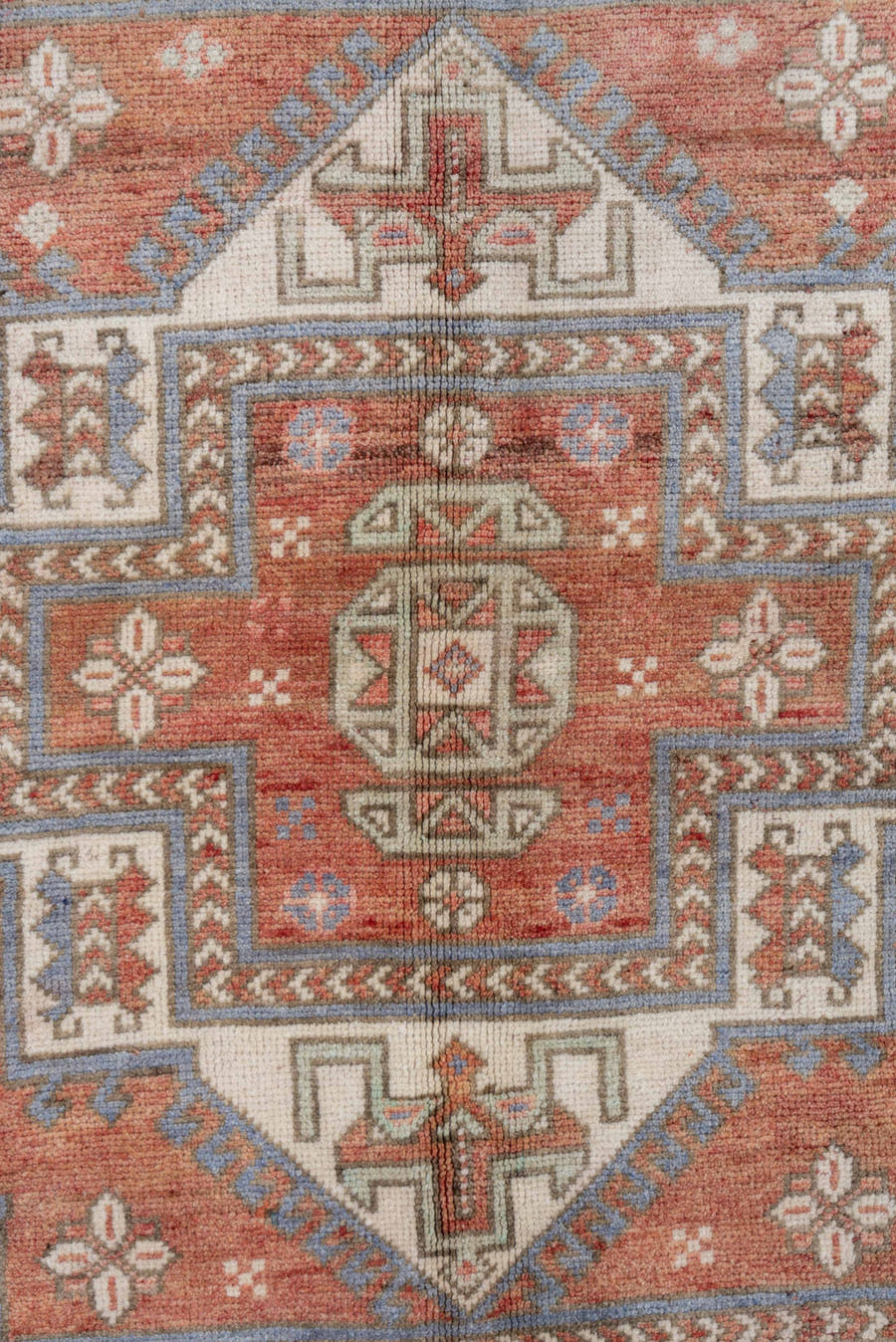 5' x 8' one-of-a-kind handmade vintage Oushak medium size rug. Color palette: terra cotta, ivory, dusty blue, rust, taupe