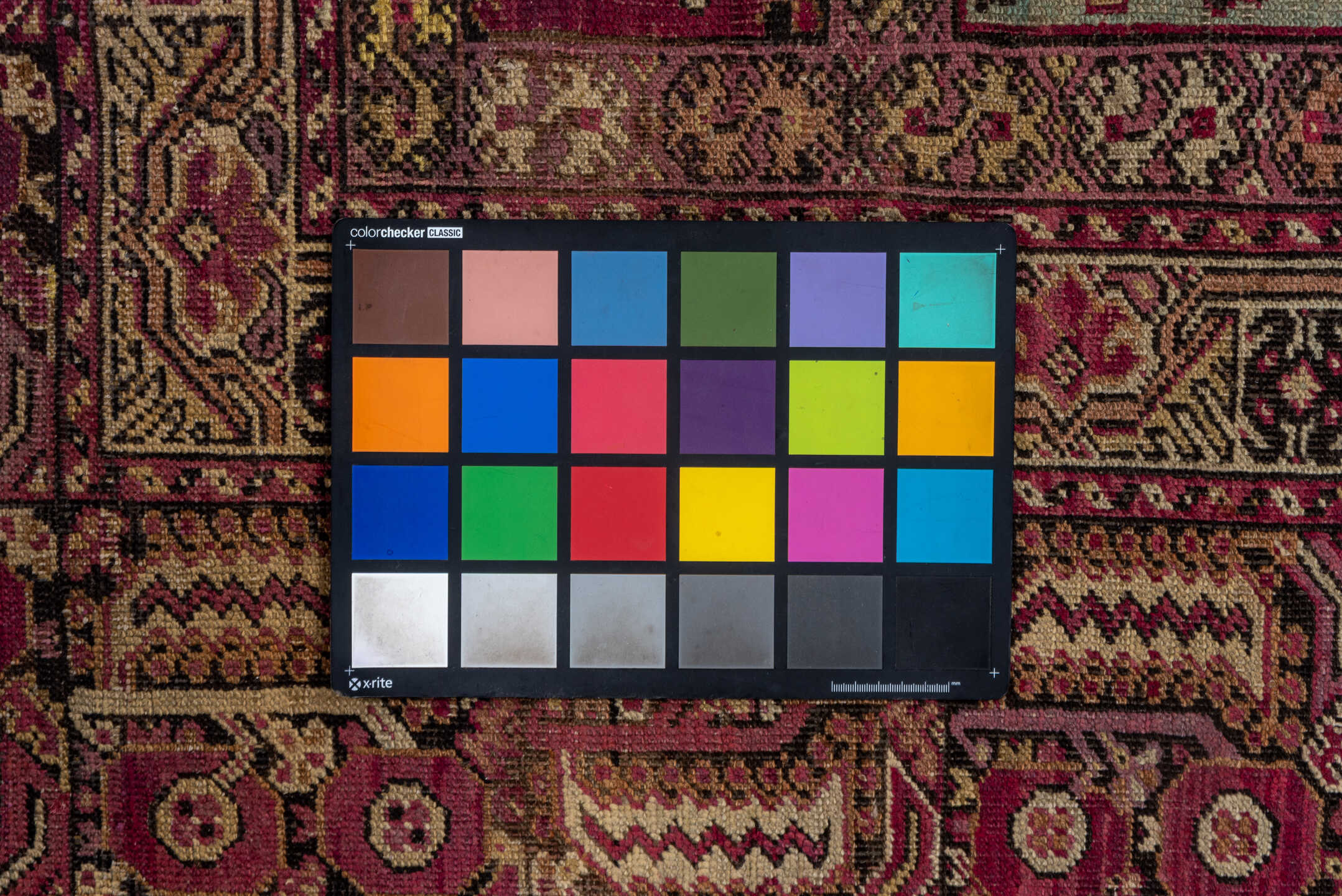 3' x 9' one-of-a-kind handmade vintage Karabagh runner rug. Color palette: black, brown, gray, orange, pink, red