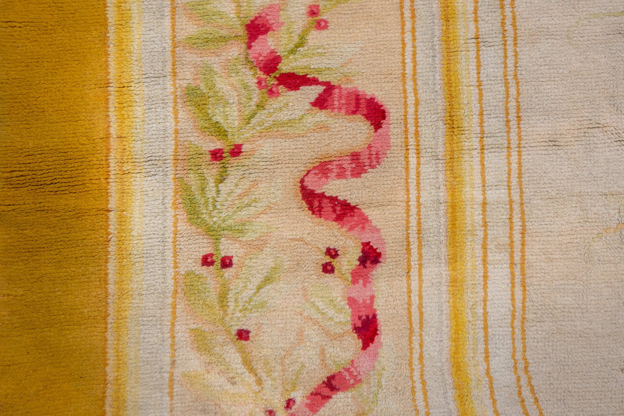 12' x 28' one-of-a-kind handmade antique Savonnerie oversize rug. Color palette: gold, ivory, rose, sage, cream, soft_green