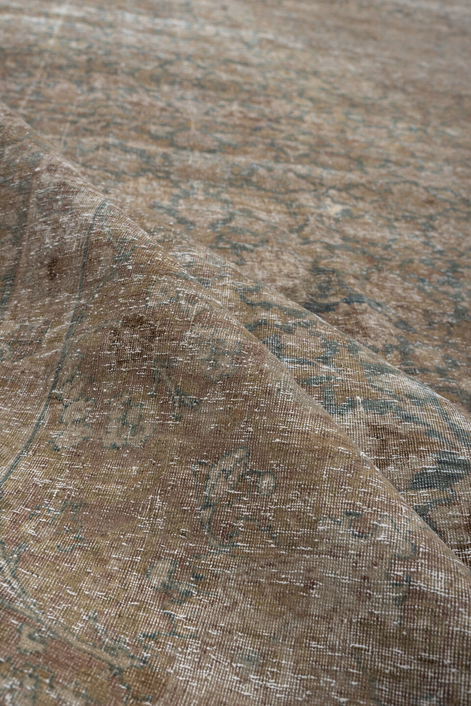 11' x 16' one-of-a-kind handmade antique Tabriz oversize rug. Color palette: taupe, faded blue, beige, ivory, camel, slate