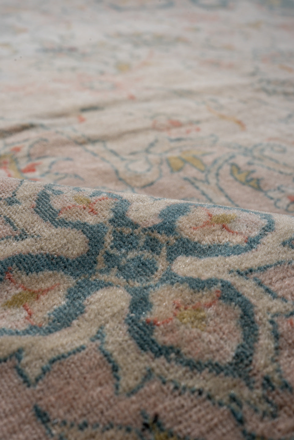 8' x 11' one-of-a-kind handmade antique Sivas large size rug. Color palette: ivory, peach, muted blue, sage, taupe, gold