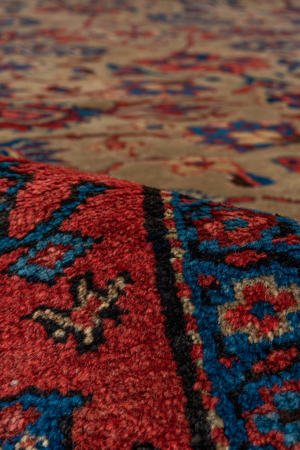 12' x 19' one-of-a-kind handmade antique Sultanabad oversize rug. Color palette: camel, rust, indigo, ivory, crimson, navy