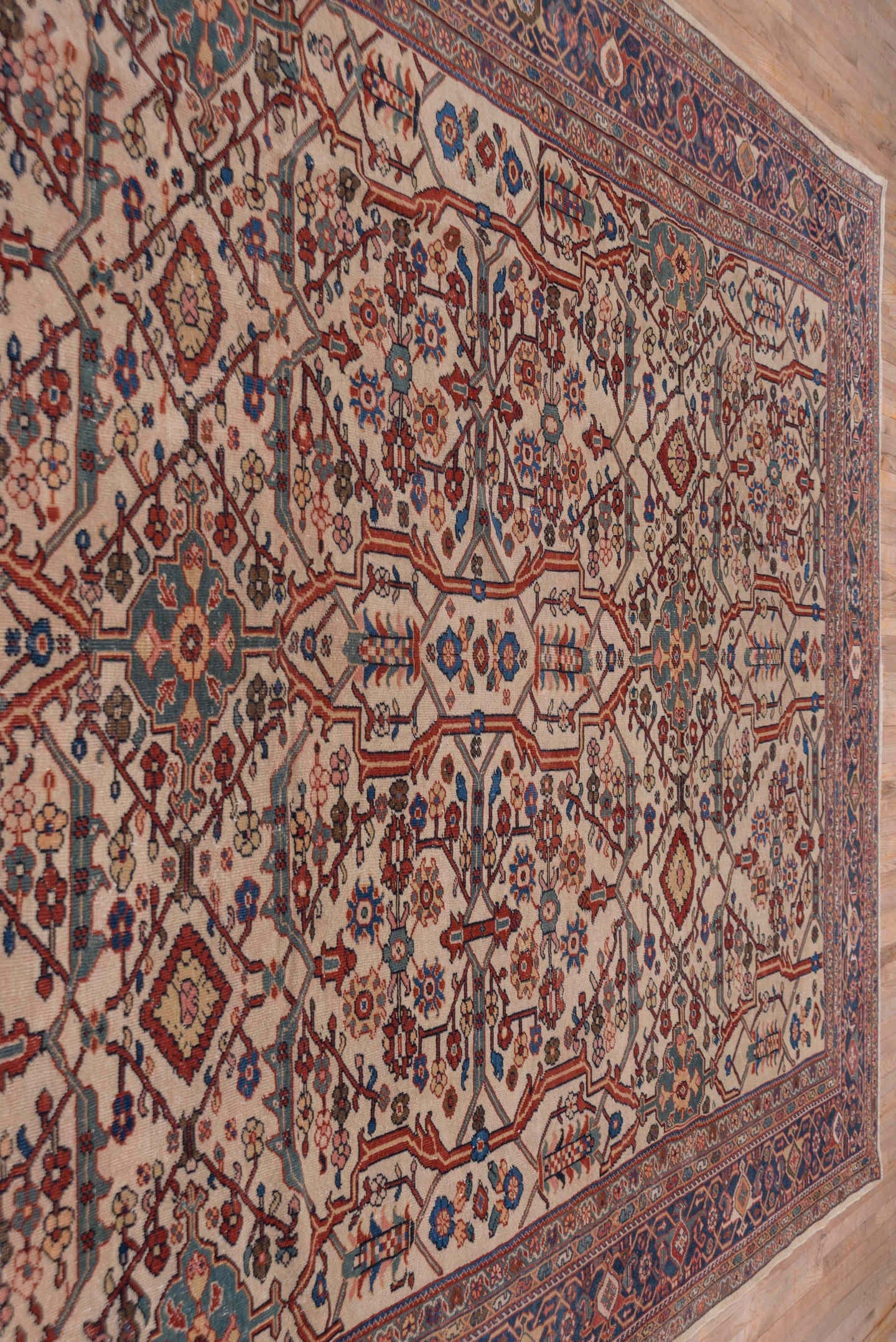 10' x 13' one-of-a-kind handmade antique Sultanabad large size rug. Color palette: ivory, navy, rust, soft blue, camel