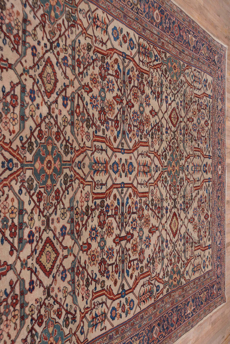 10' x 13' one-of-a-kind handmade antique Sultanabad large size rug. Color palette: ivory, navy, rust, soft blue, camel