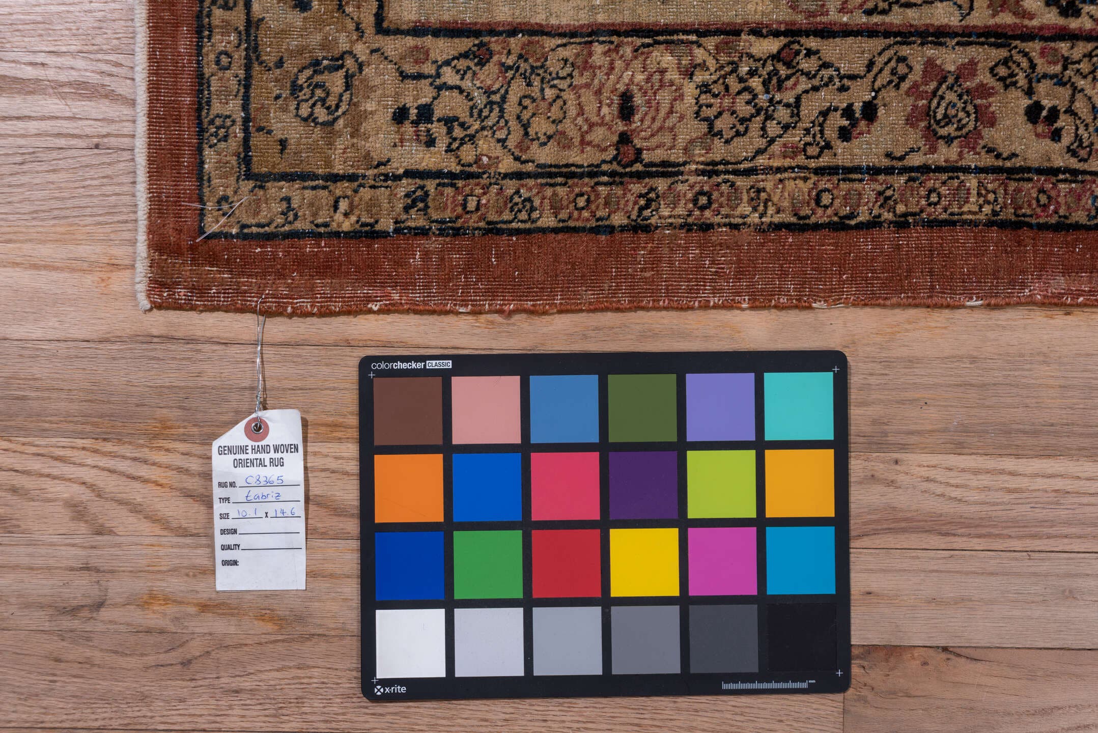 10' x 14' one-of-a-kind handmade antique Tabriz rug. Color palette: ivory, navy, terra cotta, beige, camel, slate, taupe