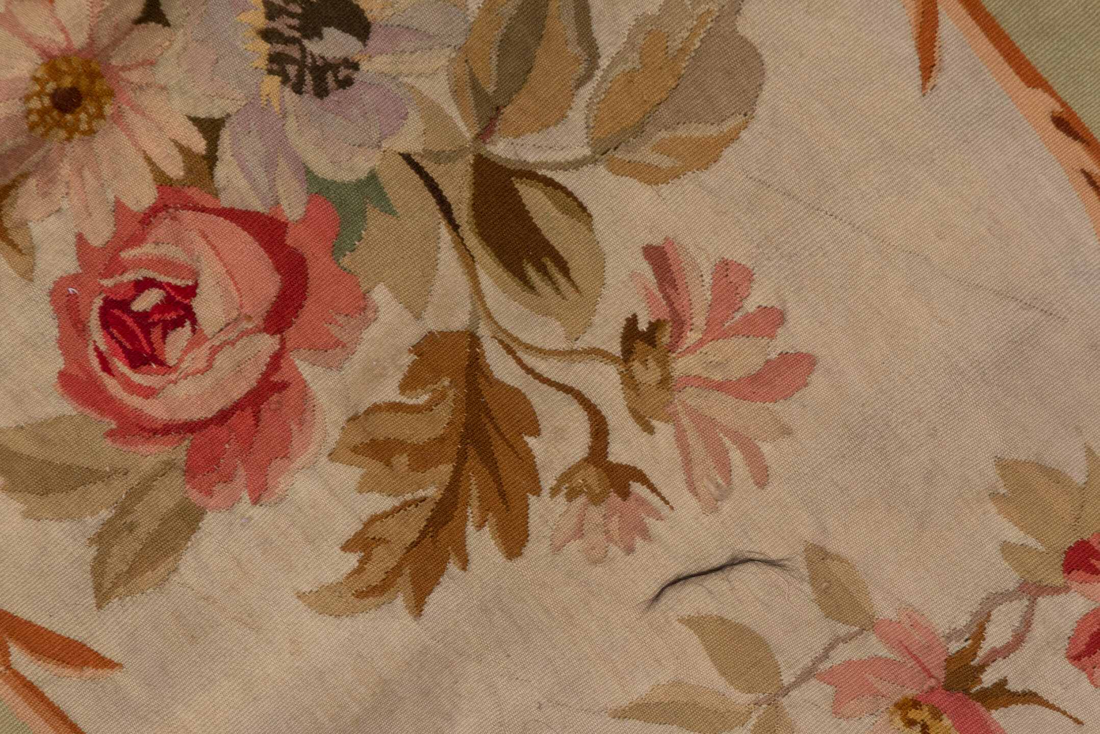 2' x 7' one-of-a-kind handmade antique Aubusson runner rug. Color palette: sage, ivory, rose, coral, gold, taupe, lavender