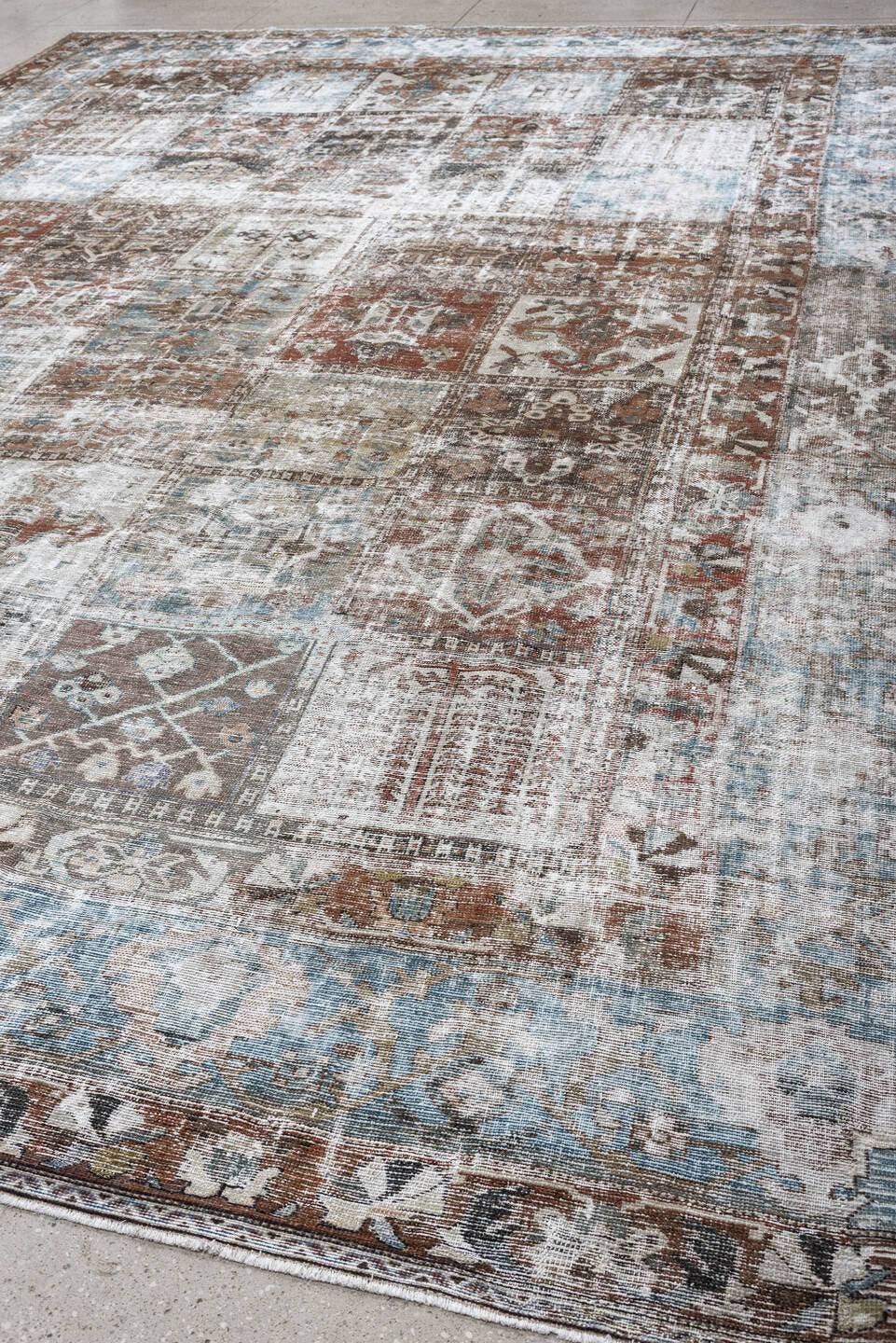 12' x 15' one-of-a-kind handmade antique Baktiary oversize rug. Color palette: sky blue, terracotta, ivory, taupe, slate
