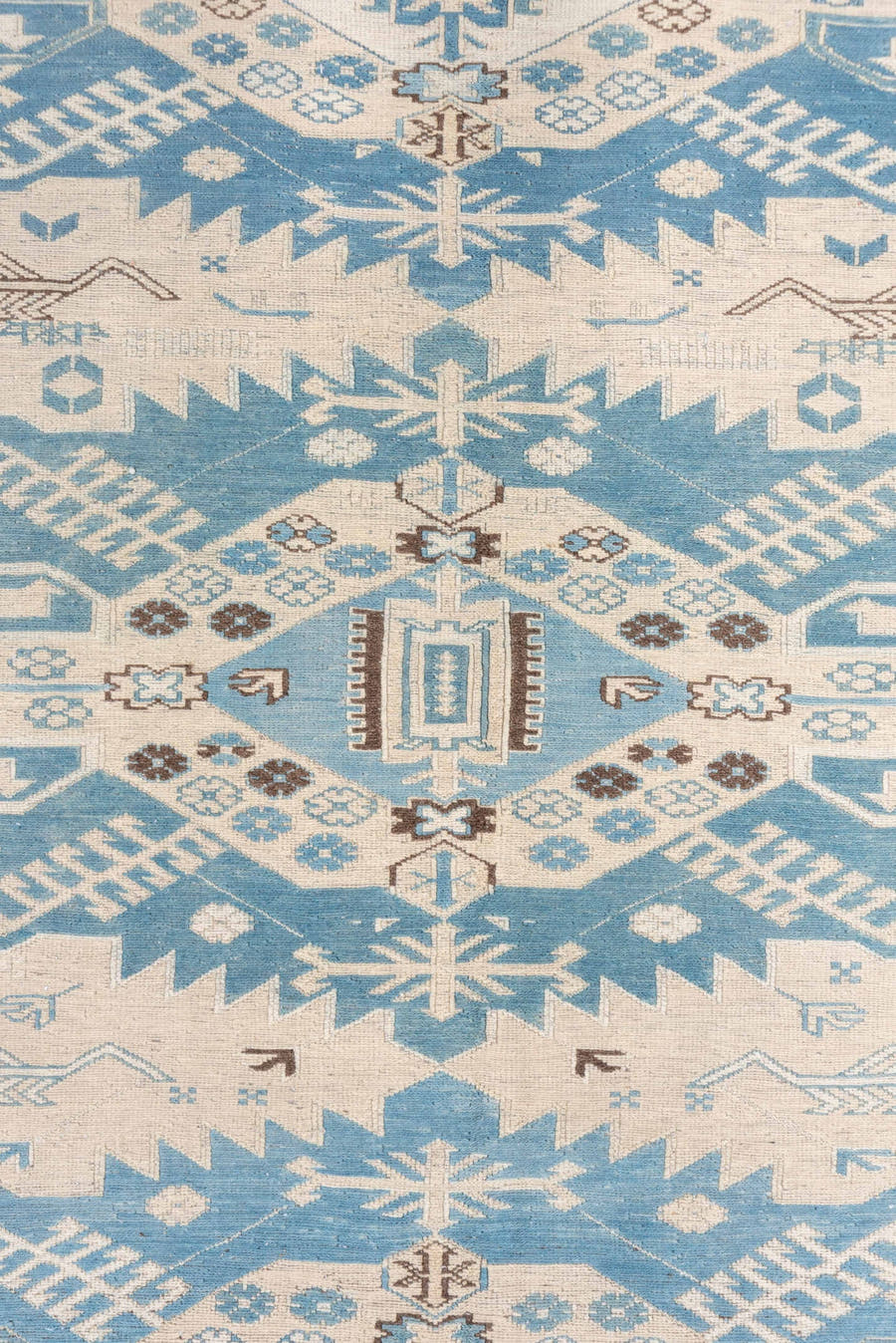 7' x 7' one-of-a-kind handmade vintage Sumak rug. Color palette: ivory, sky blue, taupe, brown, light blue, beige, gray