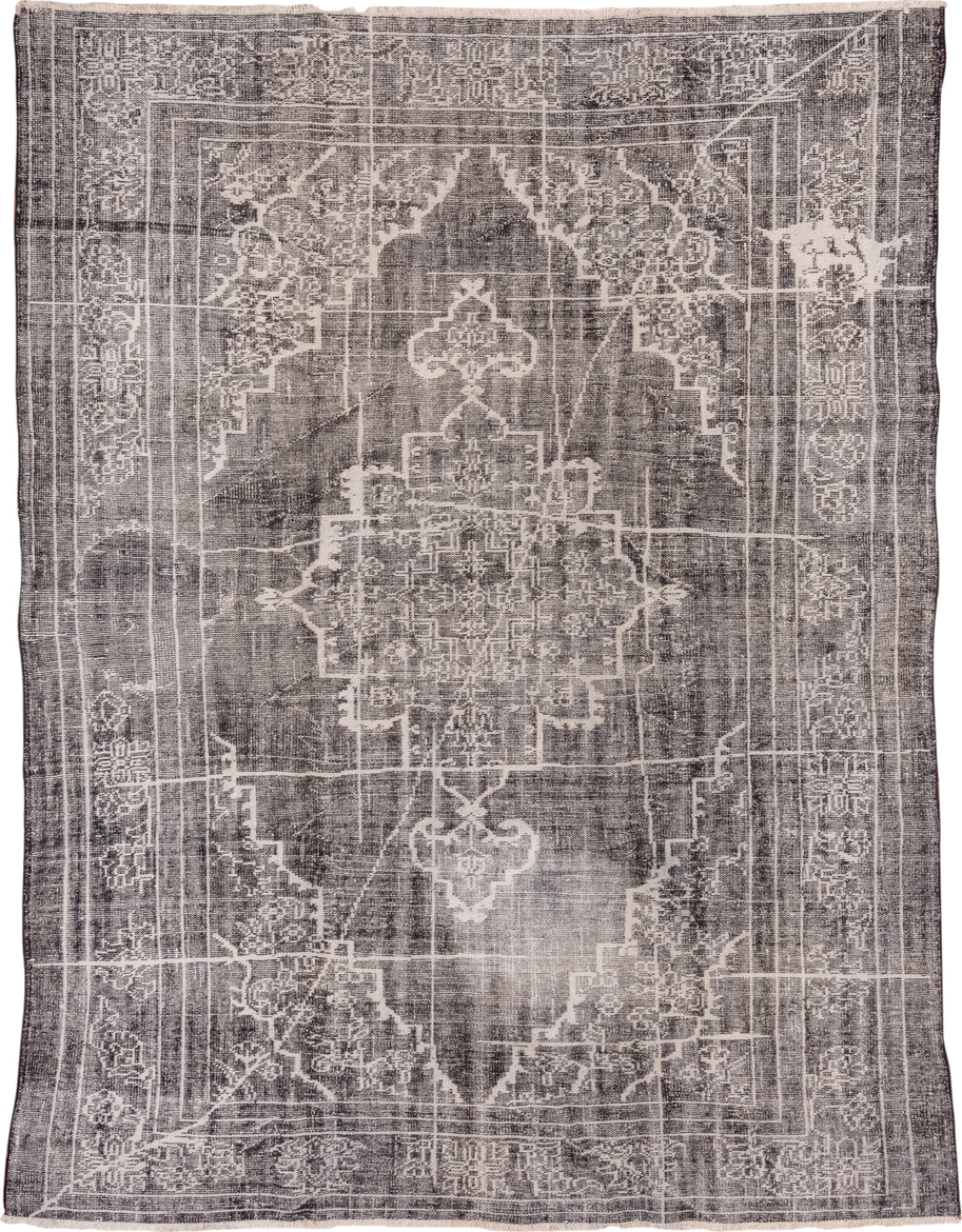 7' x 9' one-of-a-kind handmade vintage Overdyed rug. Color palette: charcoal, ivory, taupe, slate, gray, black, beige