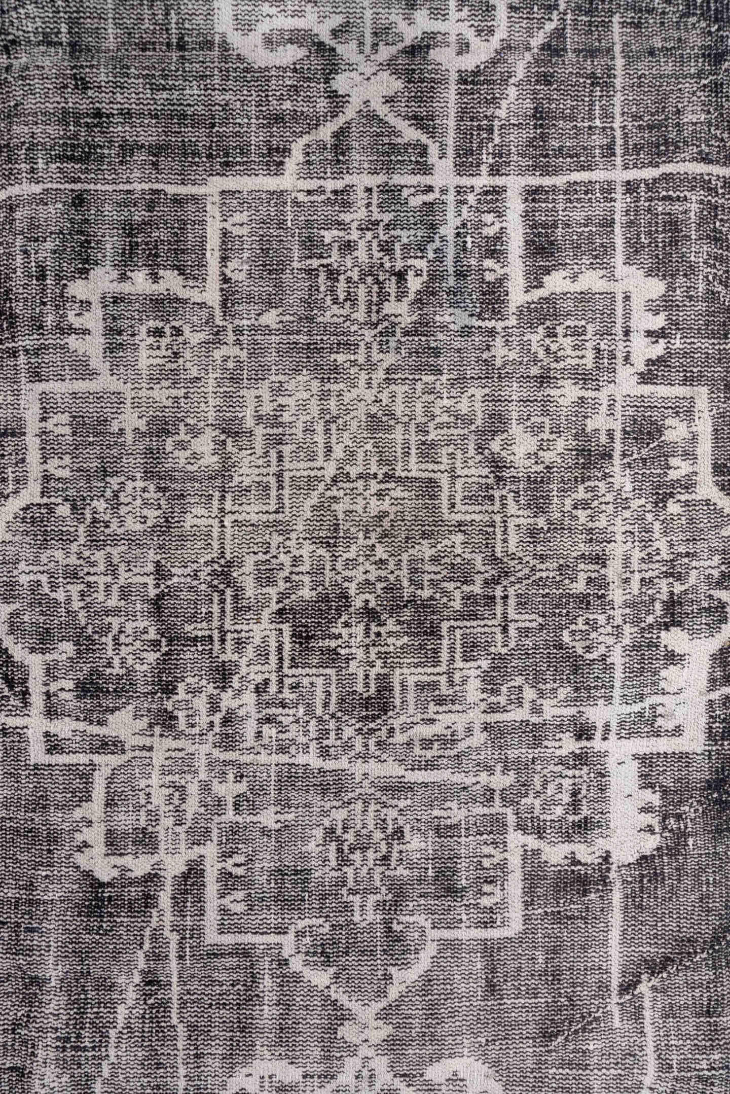 7' x 9' one-of-a-kind handmade vintage Overdyed rug. Color palette: charcoal, ivory, taupe, slate, gray, black, beige