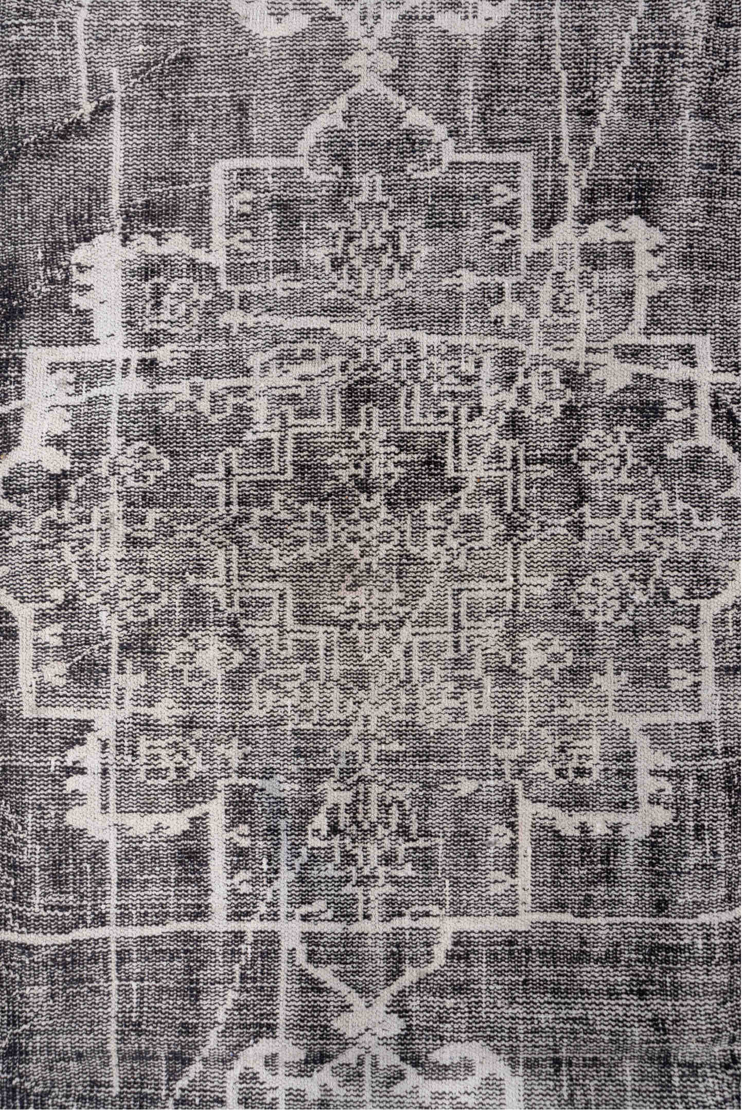 7' x 9' one-of-a-kind handmade vintage Overdyed rug. Color palette: charcoal, ivory, taupe, slate, gray, black, beige