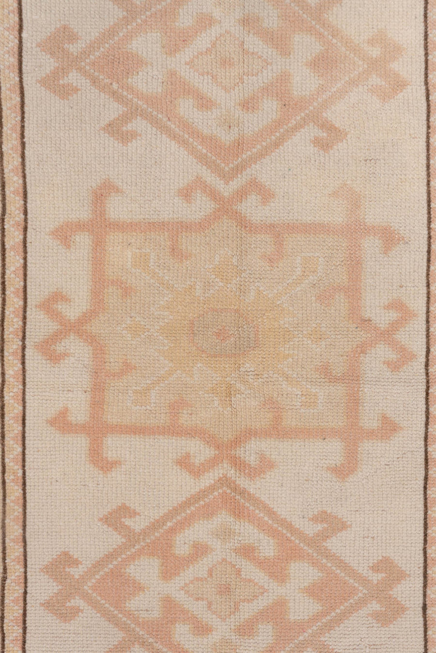 2' x 4' one-of-a-kind handmade vintage Oushak small size rug. Color palette: ivory, blush, peach, taupe, camel, pink