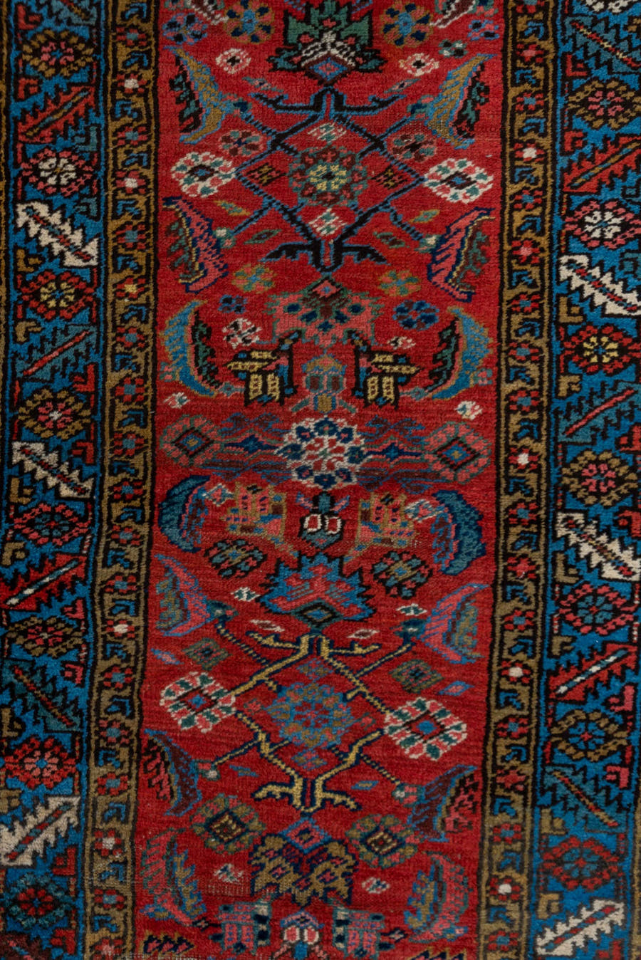 2' x 13' one-of-a-kind handmade vintage Heriz runner rug. Color palette: red, blue, navy, ivory, rust, gold, charcoal