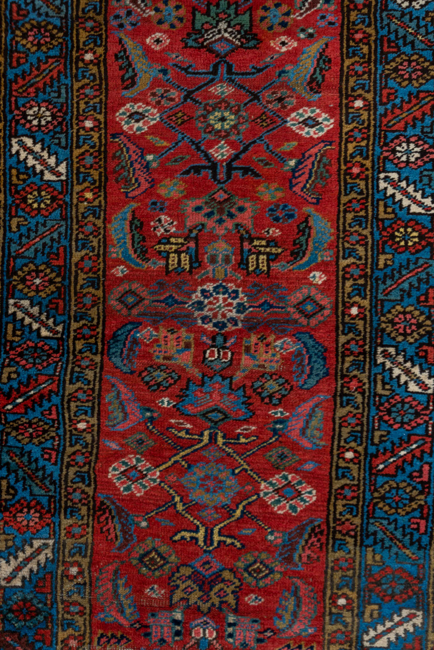 2' x 13' one-of-a-kind handmade vintage Heriz runner rug. Color palette: red, blue, navy, ivory, rust, gold, charcoal