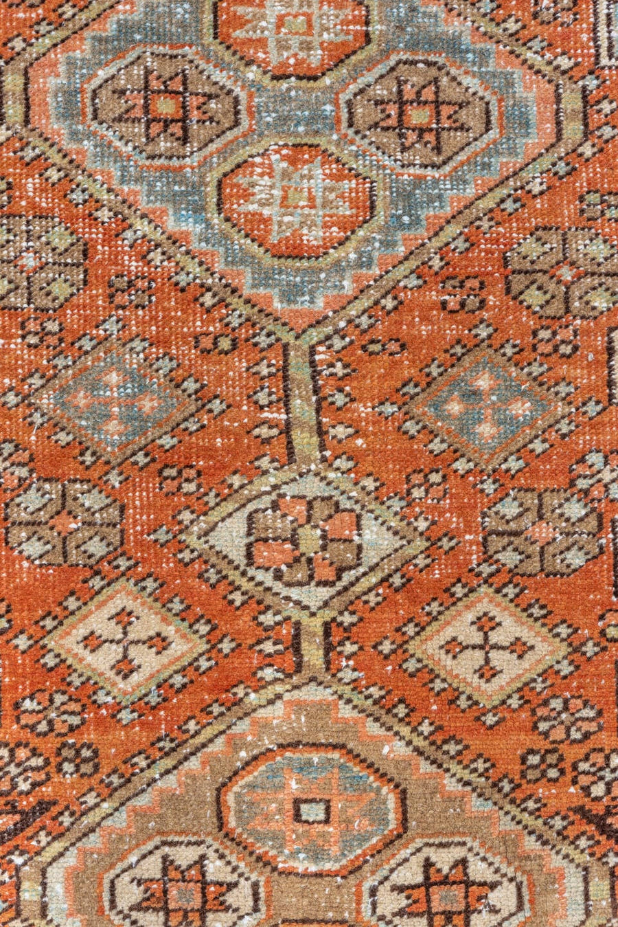 2' x 10' one-of-a-kind handmade vintage Heriz runner rug. Color palette: terra cotta, ivory, pale blue, taupe, rust, sage
