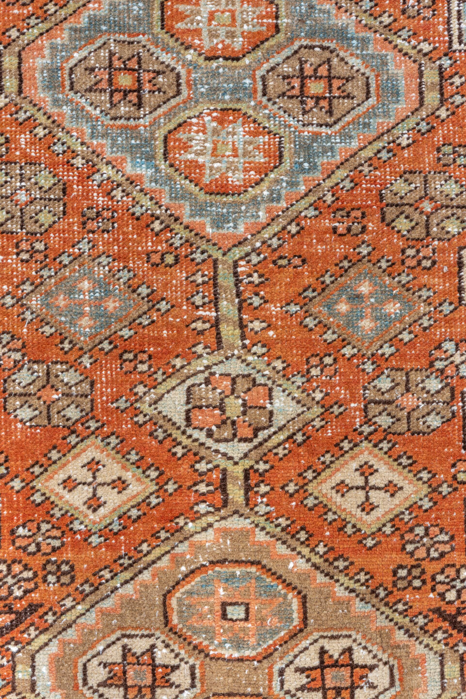 2' x 10' one-of-a-kind handmade vintage Heriz runner rug. Color palette: brown, dark gray, gray, light gray, off-white, pink