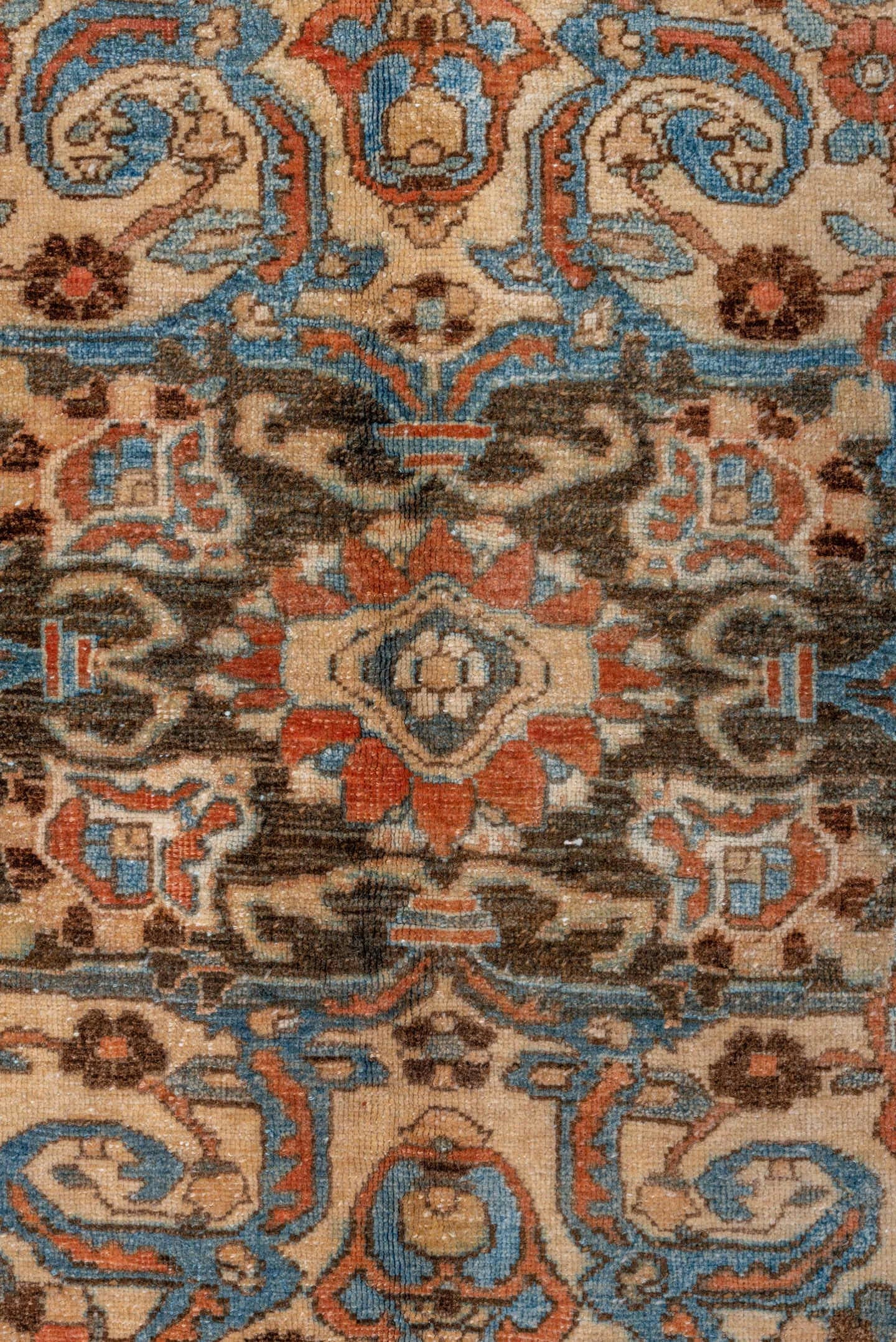 7' x 9' one-of-a-kind handmade vintage Baktiary rug. Color palette: terra cotta, sky blue, ivory, brown, camel, slate