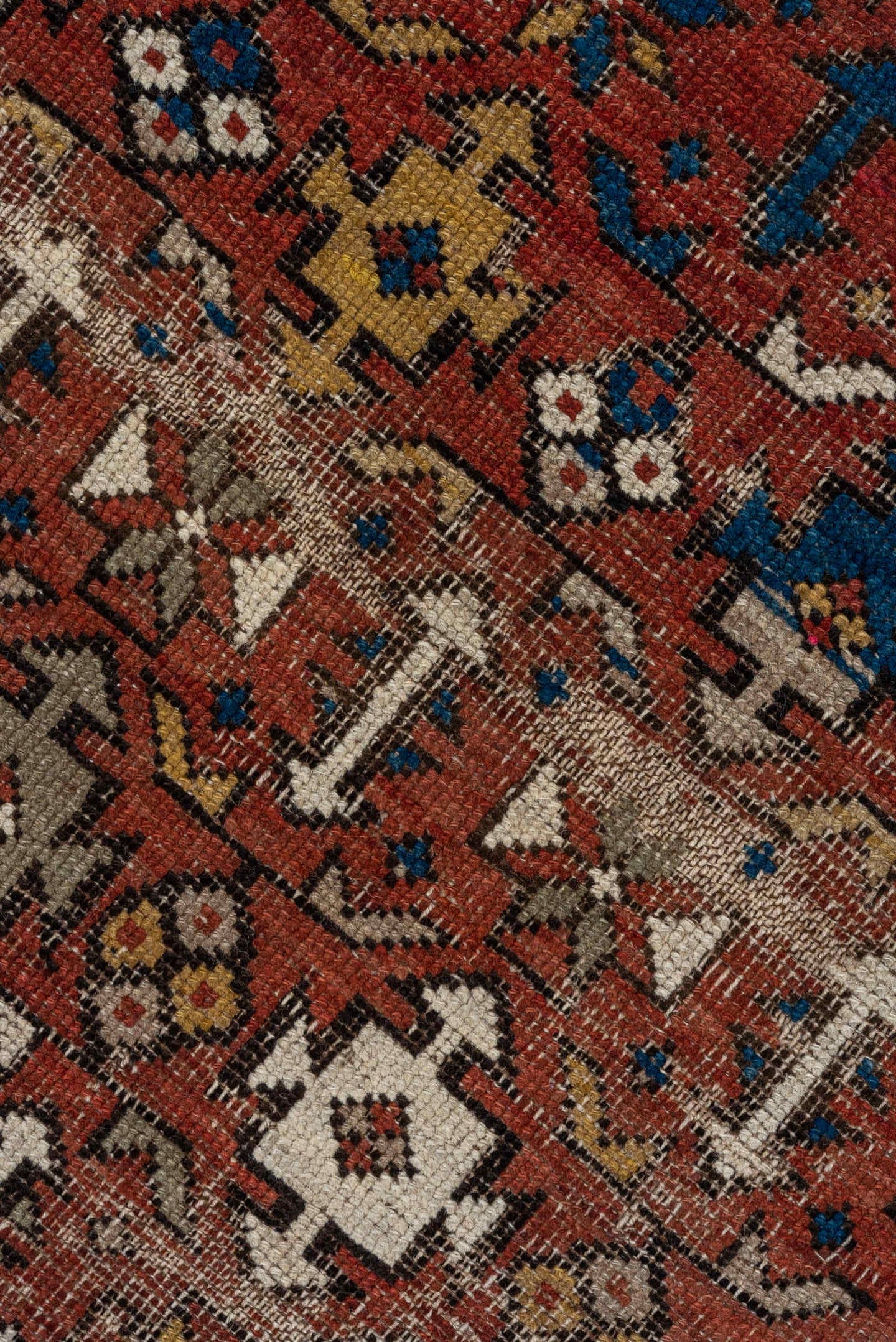 4' x 7' one-of-a-kind handmade vintage Shirvan rug. Color palette: rust, ivory, blue, camel, brown, charcoal, terracotta
