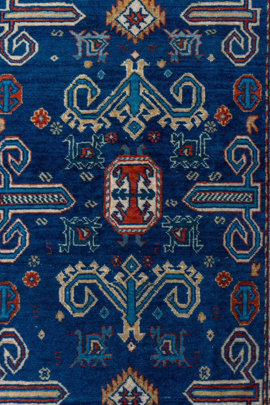 4' x 5' one-of-a-kind handmade vintage Shirvan small size rug. Color palette: navy, ivory, rust, sky_blue, crimson, camel