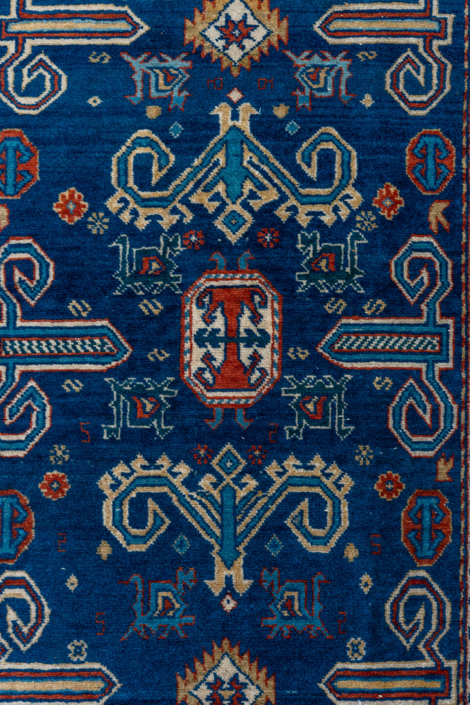 4' x 5' one-of-a-kind handmade vintage Shirvan small size rug. Color palette: navy, ivory, rust, sky_blue, crimson, camel