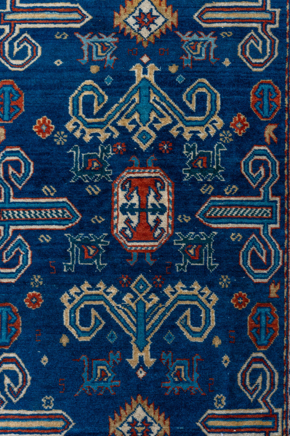 4' x 5' one-of-a-kind handmade vintage Shirvan small size rug. Color palette: navy, ivory, rust, sky_blue, crimson, camel
