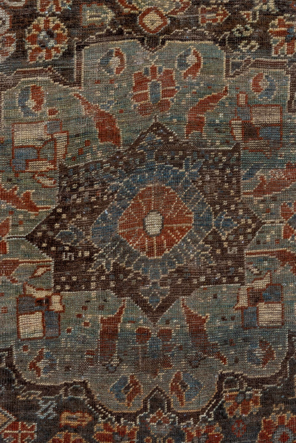 7' x 9' one-of-a-kind handmade vintage Shiraz rug. Color palette: rust, ivory, charcoal, slate, terracotta, brown, sky_blue