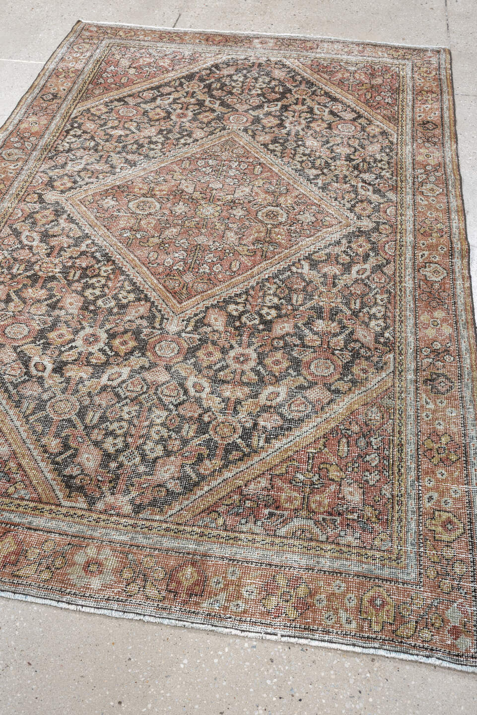 4' x 6' one-of-a-kind handmade vintage Mahal small size rug. Color palette: terra cotta, charcoal, ivory, rose, gold, taupe