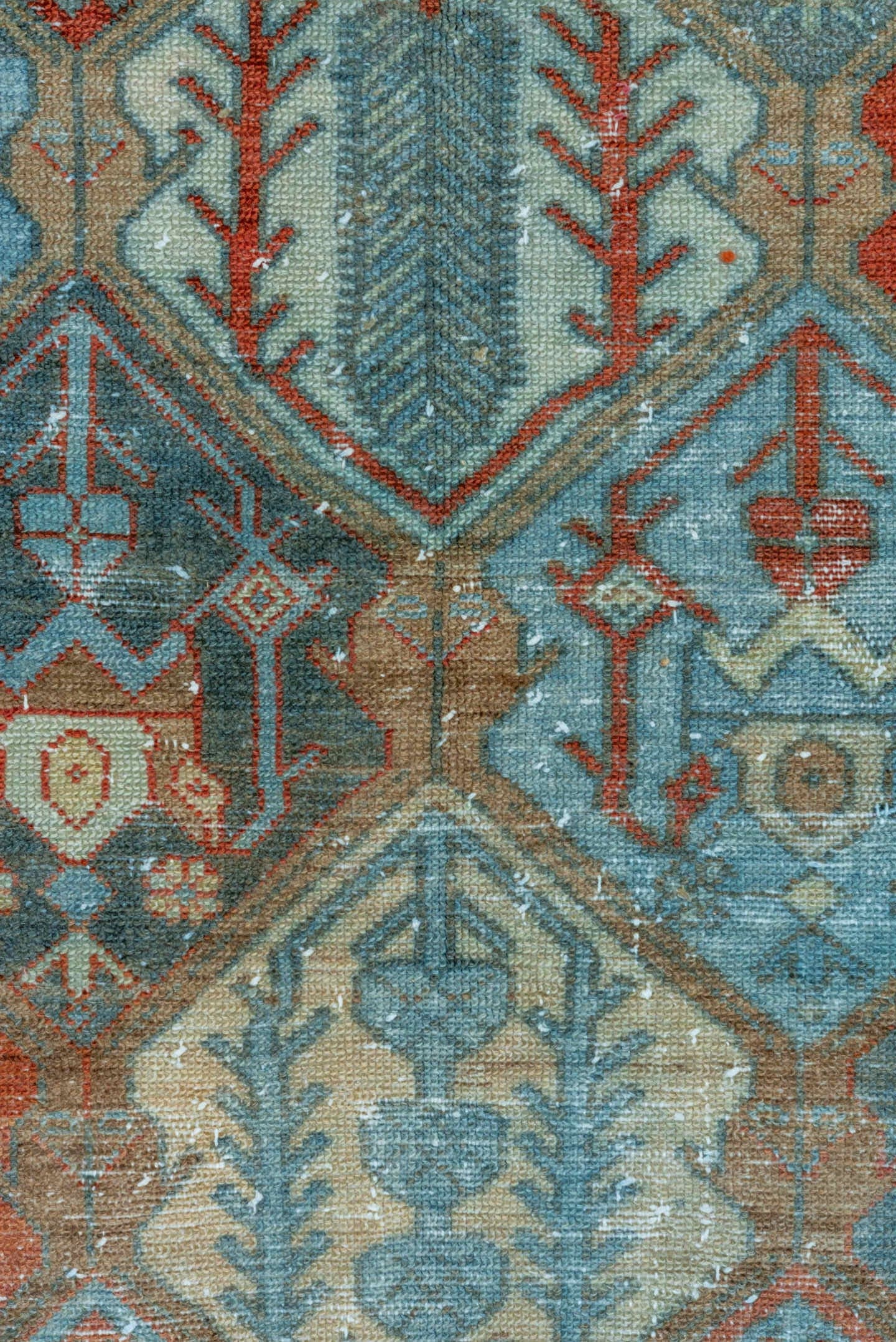 5' x 10' one-of-a-kind handmade vintage Baktiary runner rug. Color palette: rust, sky blue, ivory, camel, teal, terra cotta