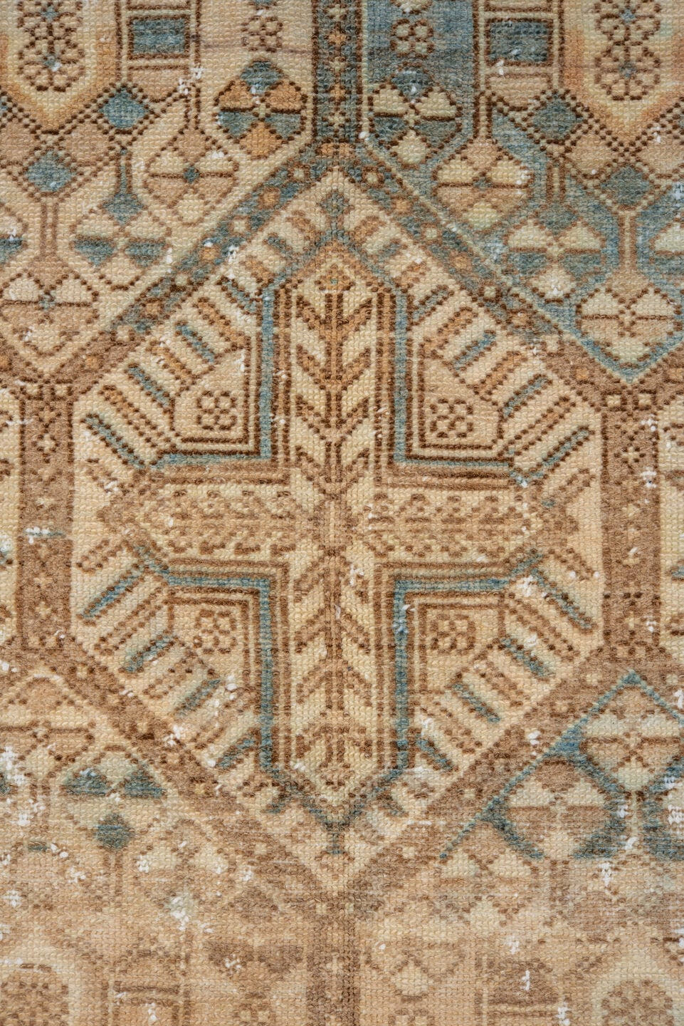 5' x 10' one-of-a-kind handmade vintage Baktiary medium size rug. Color palette: camel, ivory, taupe, brown, sky_blue, beige