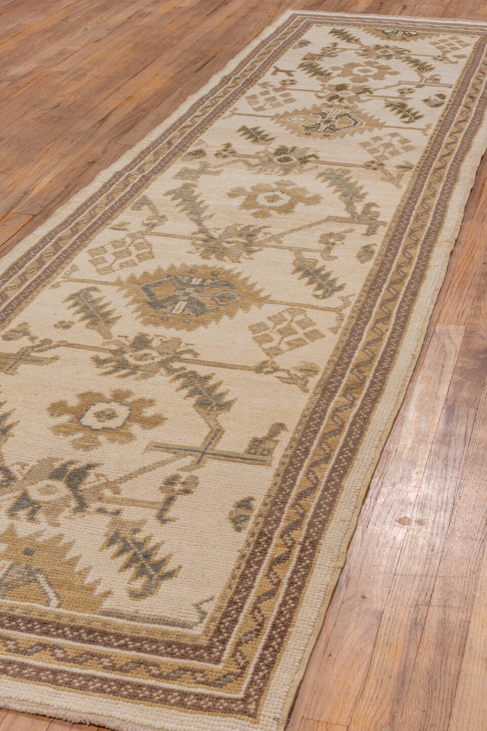 3' x 11' one-of-a-kind handmade vintage Oushak runner rug. Color palette: brown, gray, light gray, off-white, orange, snow