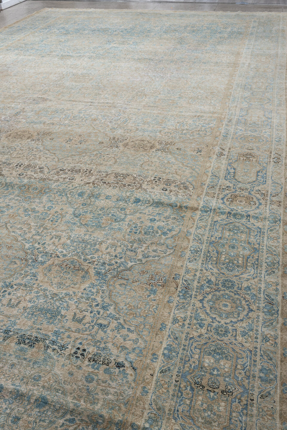12' x 23' one-of-a-kind handmade vintage Kerman oversize rug. Color palette: ivory, sky blue, taupe, beige, slate, sand